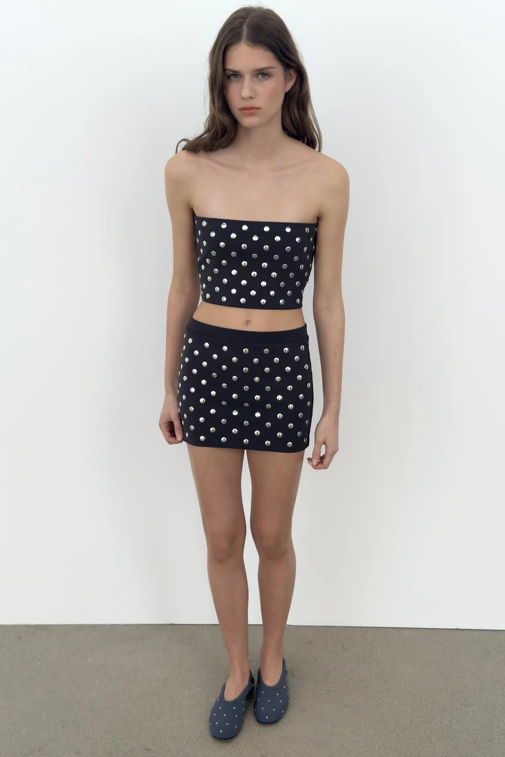 Мини-юбка с заклепками — Юбки