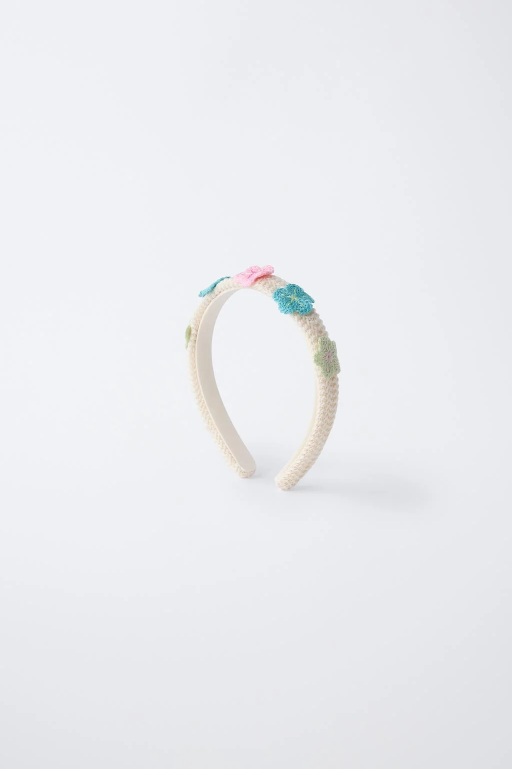 Вязаная повязка на голову в цветочек — Привоски для волос