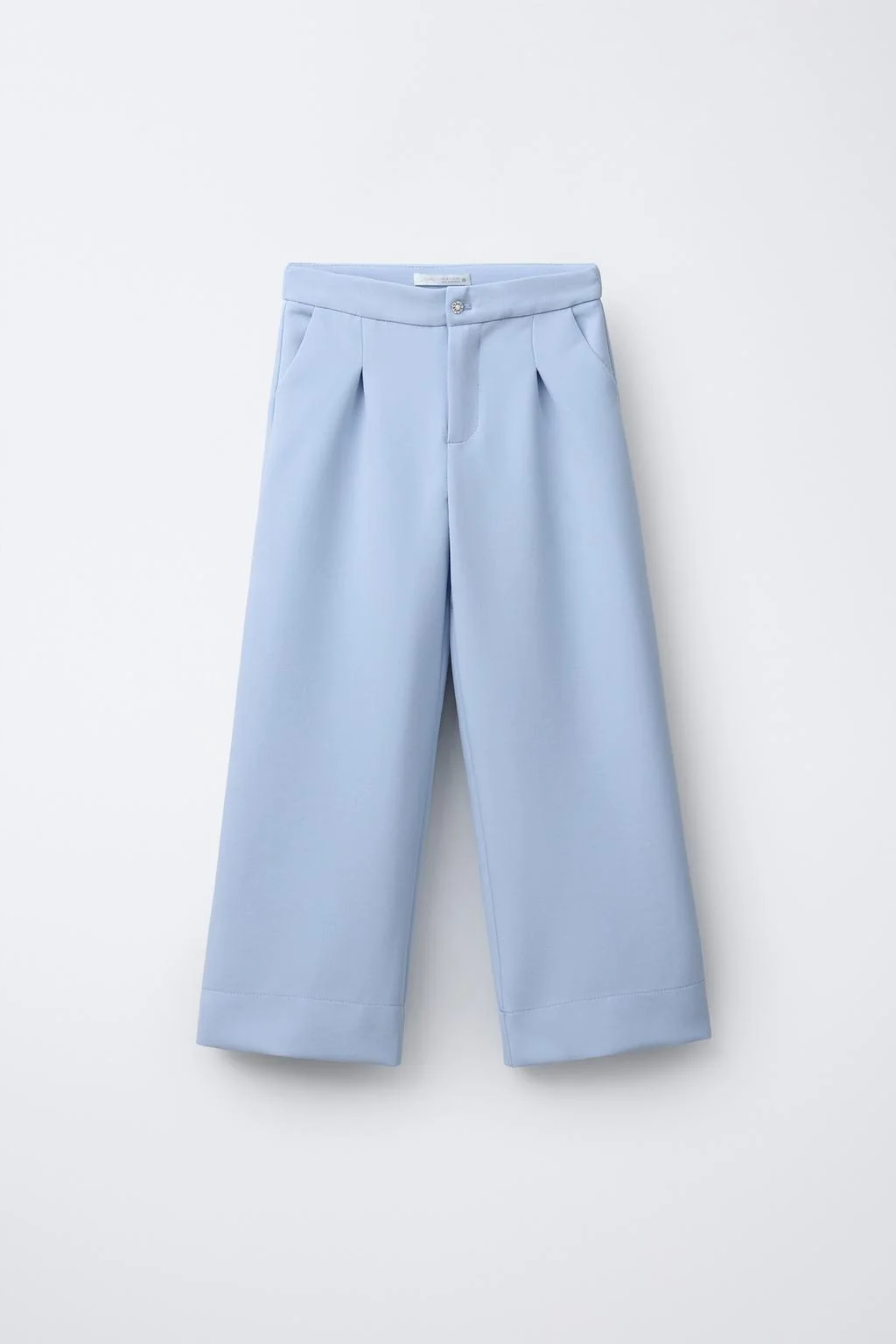 Брюки приталенного кроя с каменной пуговицей