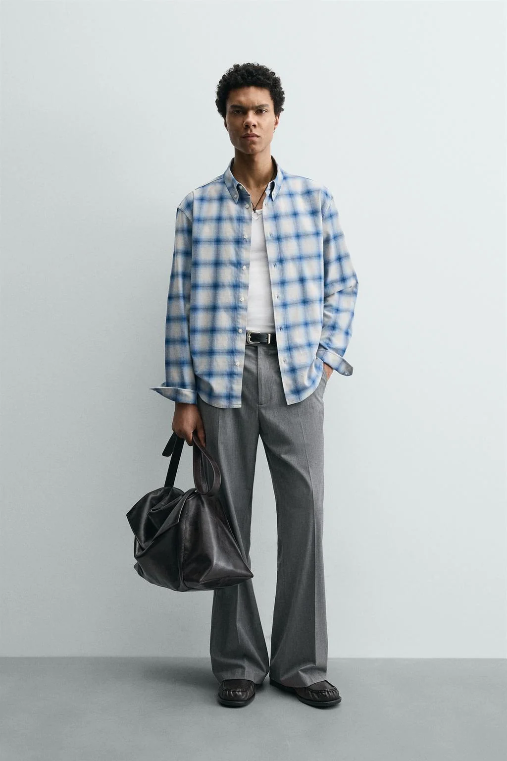 Рубашка в клетку свободного кроя