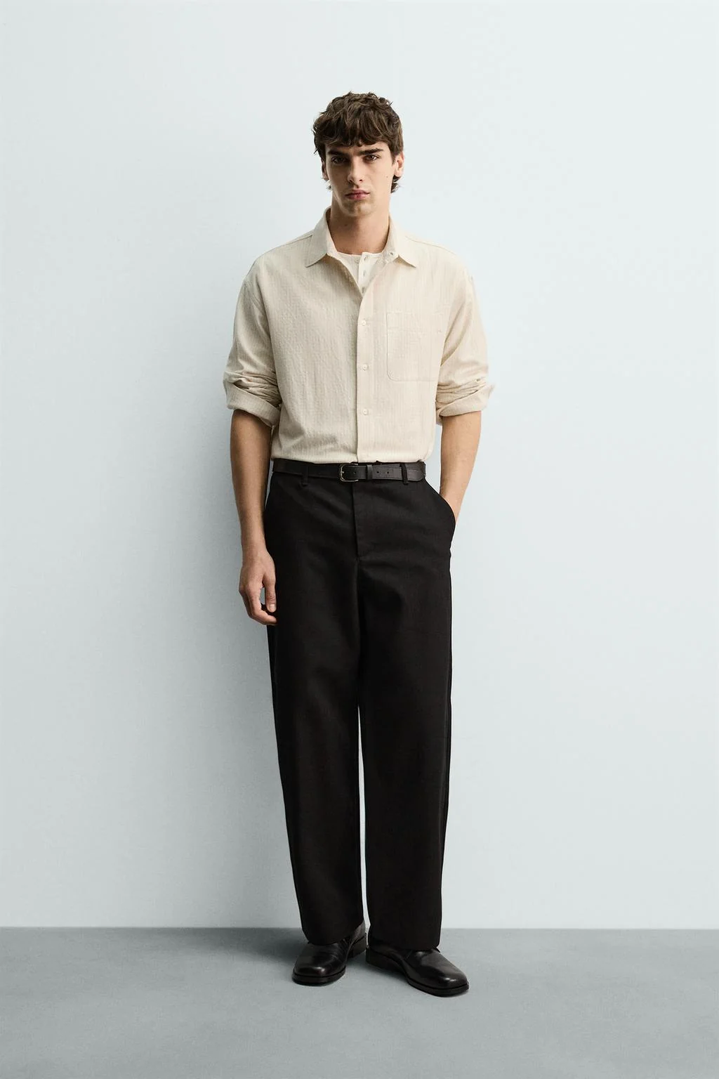 Рубашка в клетку свободного кроя