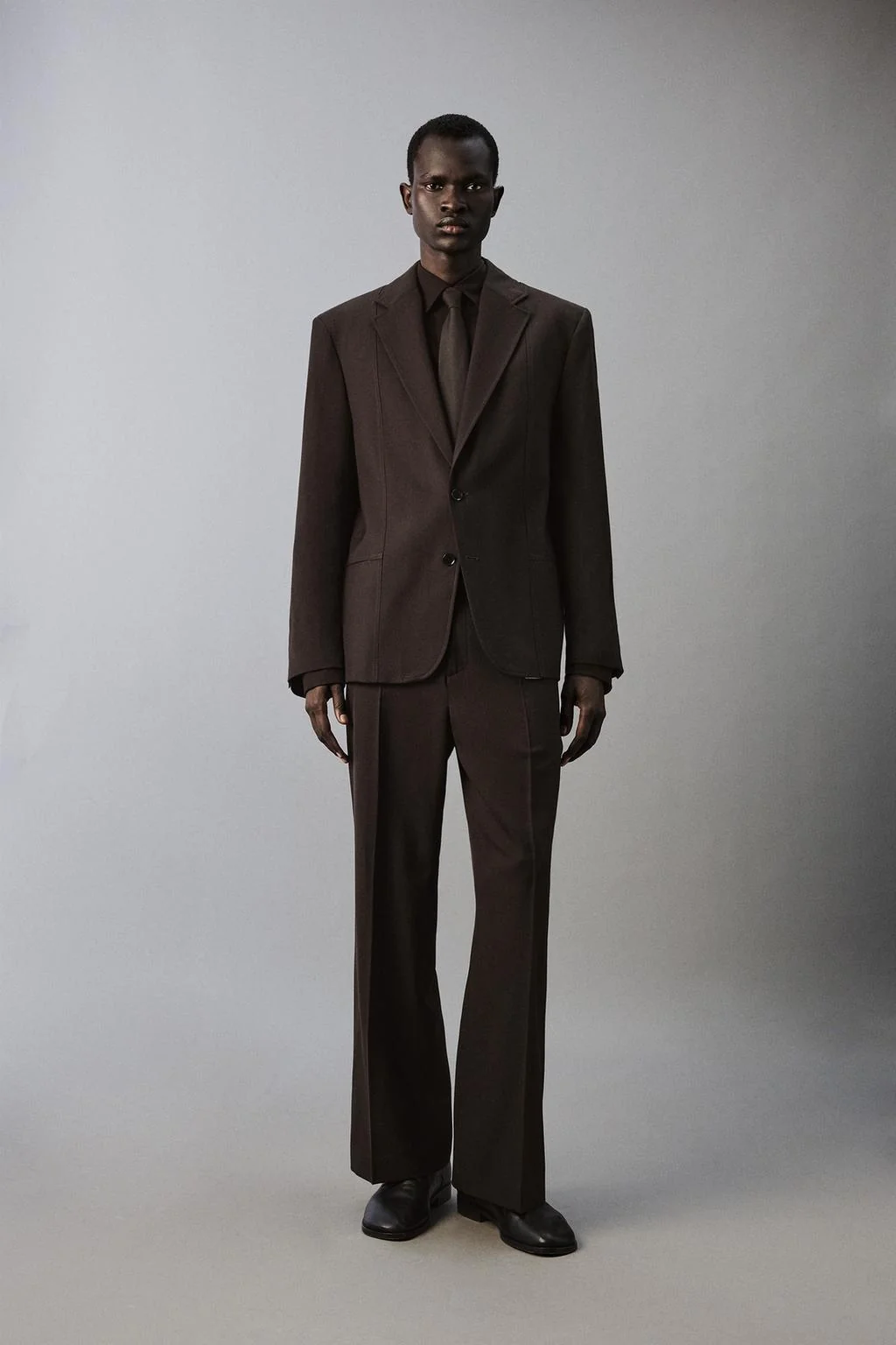 Брюки костюмные расклешённого кроя из шерстяной смеси