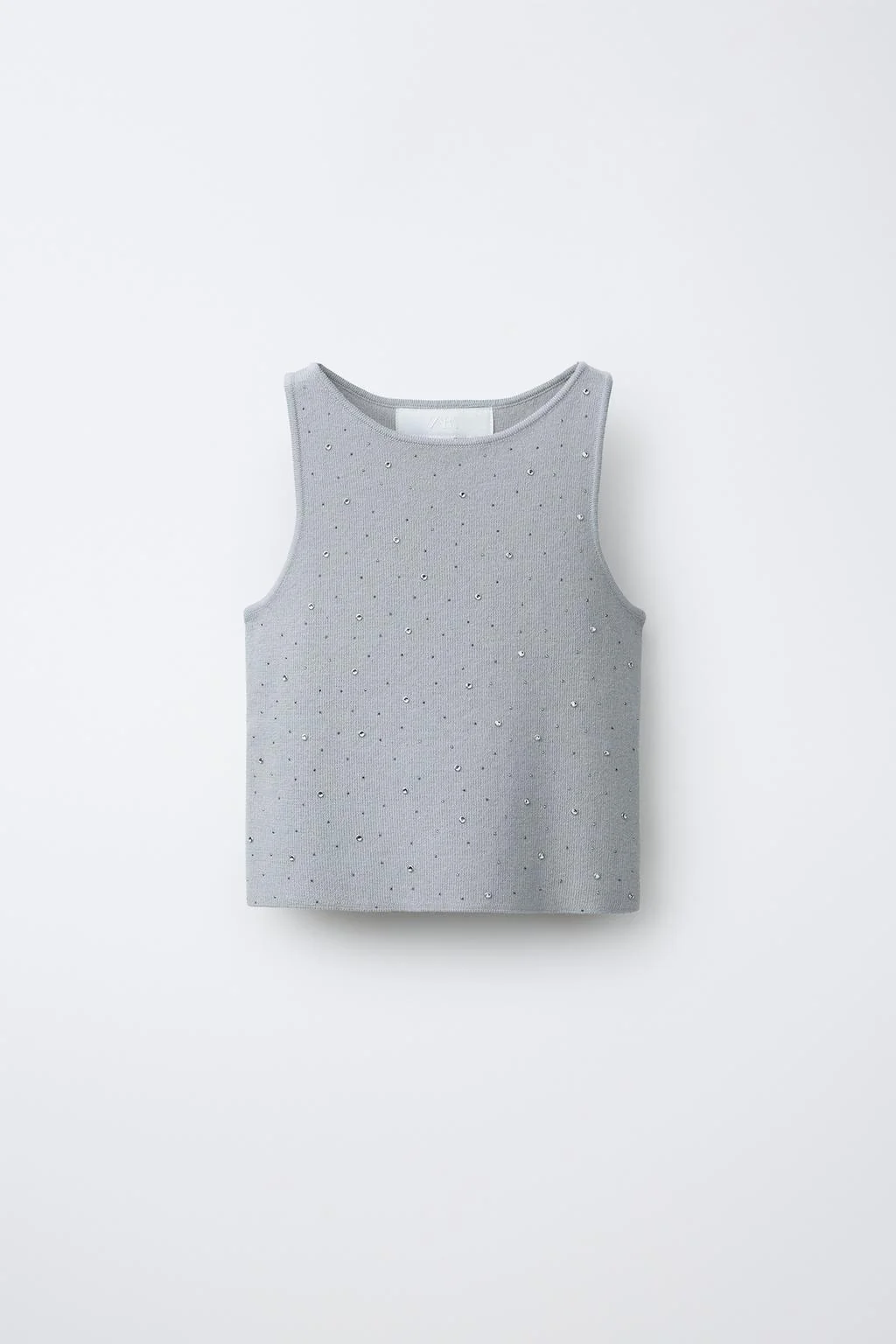 Блестящий трикотажный топ — Коллекция