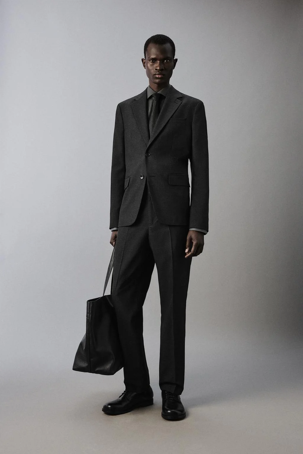 Брюки в клетку текстурированные