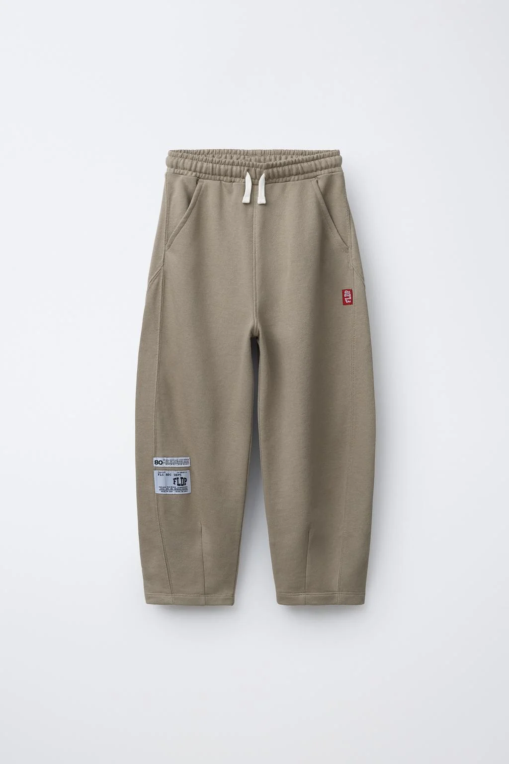 Брюки бочонок с нашивкой лейблы