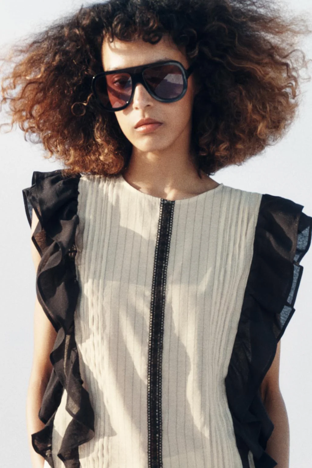 Блуза в полоску с оборками — Блузки