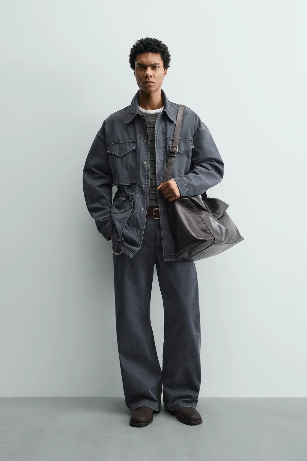 Фактурные хлопковые брюки с эффектом потёртости