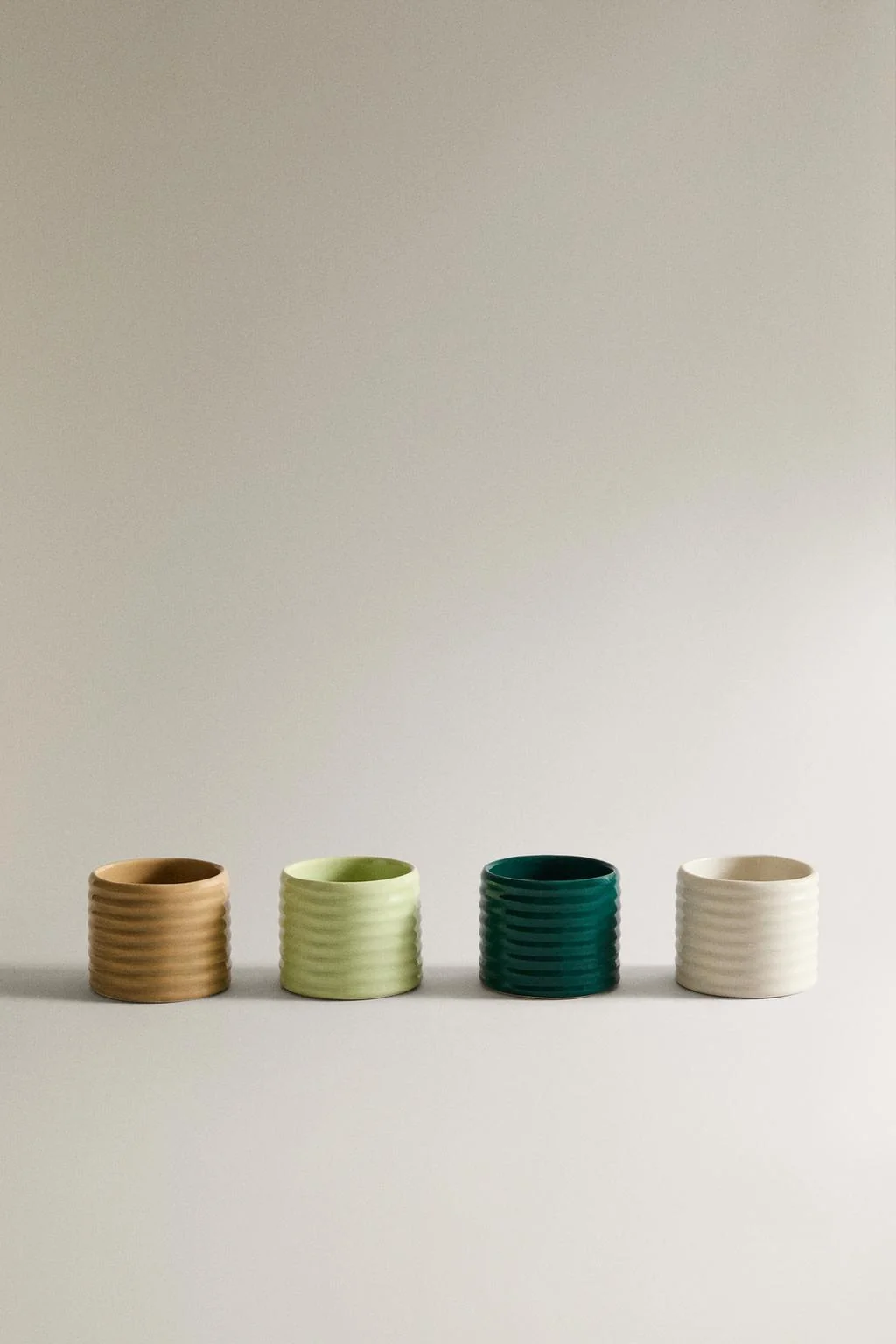 НАБОР КЕРАМИЧЕСКИХ КОЛЬЦЕВ ДЛЯ САЛФЕТОК С РЕЛЬЕФНЫМ РИСУНКОМ (4 ШТ.)