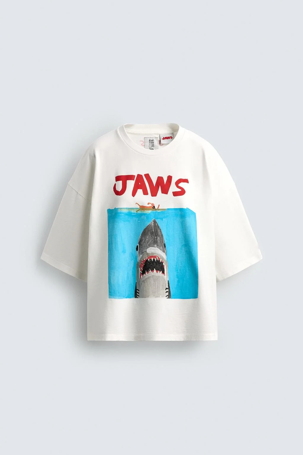 JAWS ©UCS LLC И AMBLIN X ДИЛАНА КЛУБА ФУТБОЛОК X ZARA ИЛЛЮСТРАЦИОННАЯ ФУТБОЛКА
