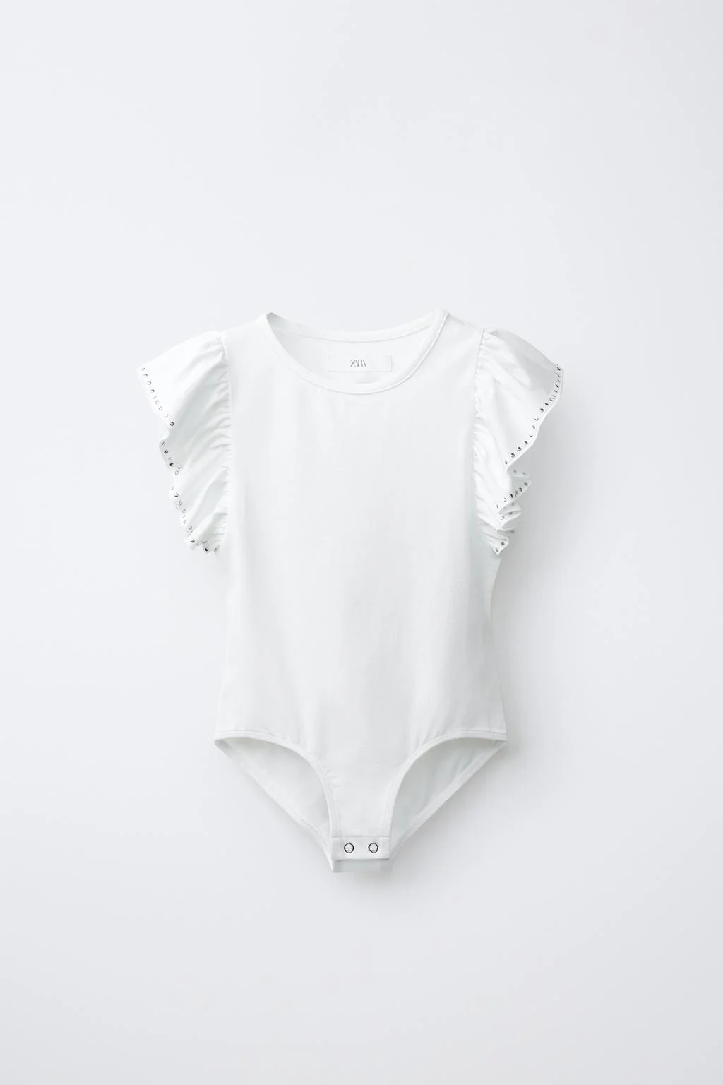 КОМБИНЕЗОН ИЗ МОДАЛЬНОЙ ТКАНИ С ВОЛАНАМИ И ЗАКЛЕПКАМИ