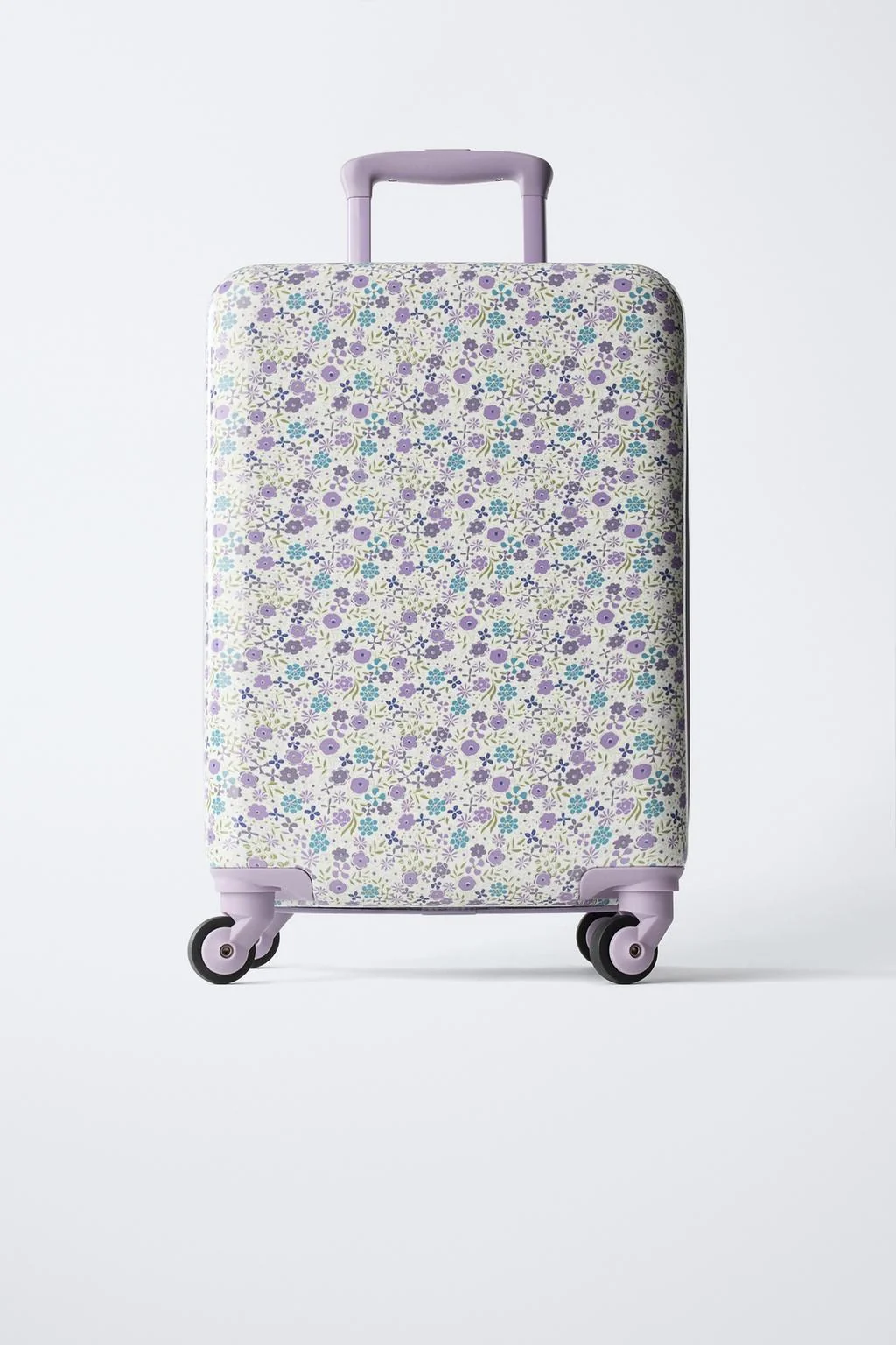 Цветочный дорожный чемодан