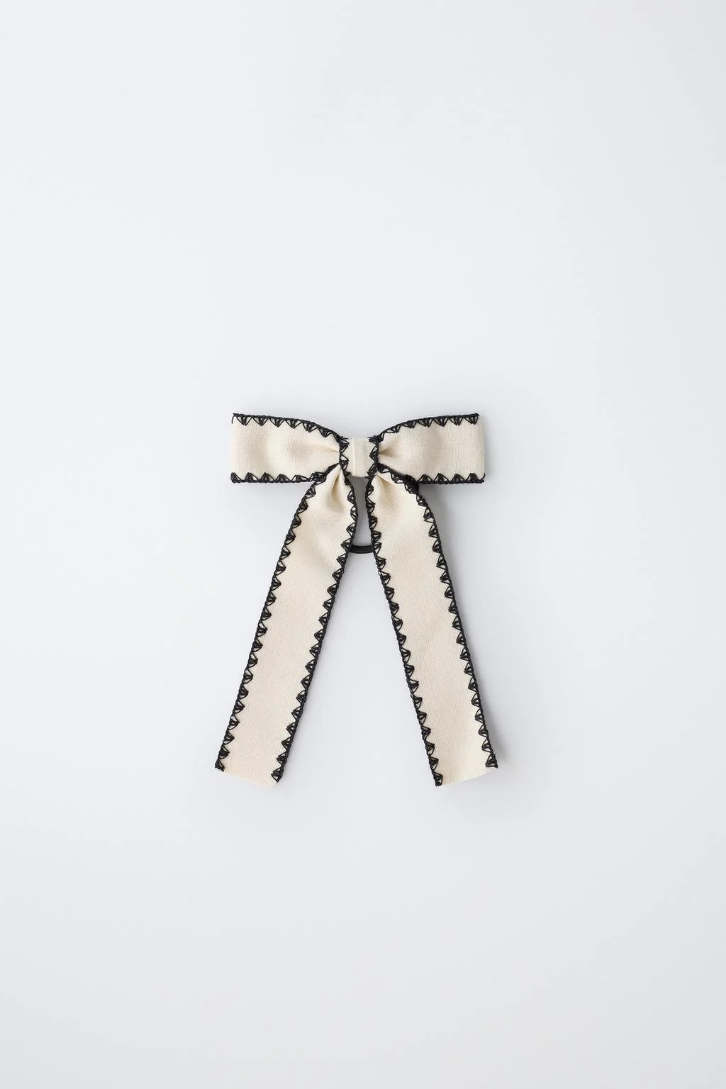 Резинка для волос с бантом контрастной отделки