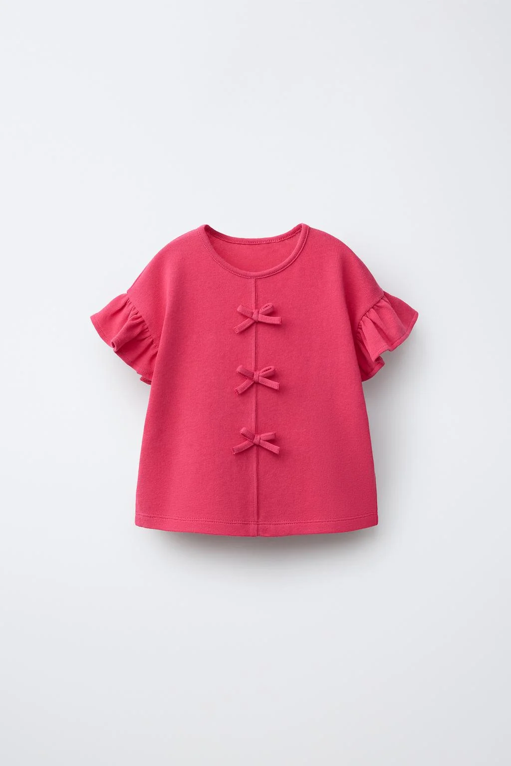 Футболка с бантом и оборками
