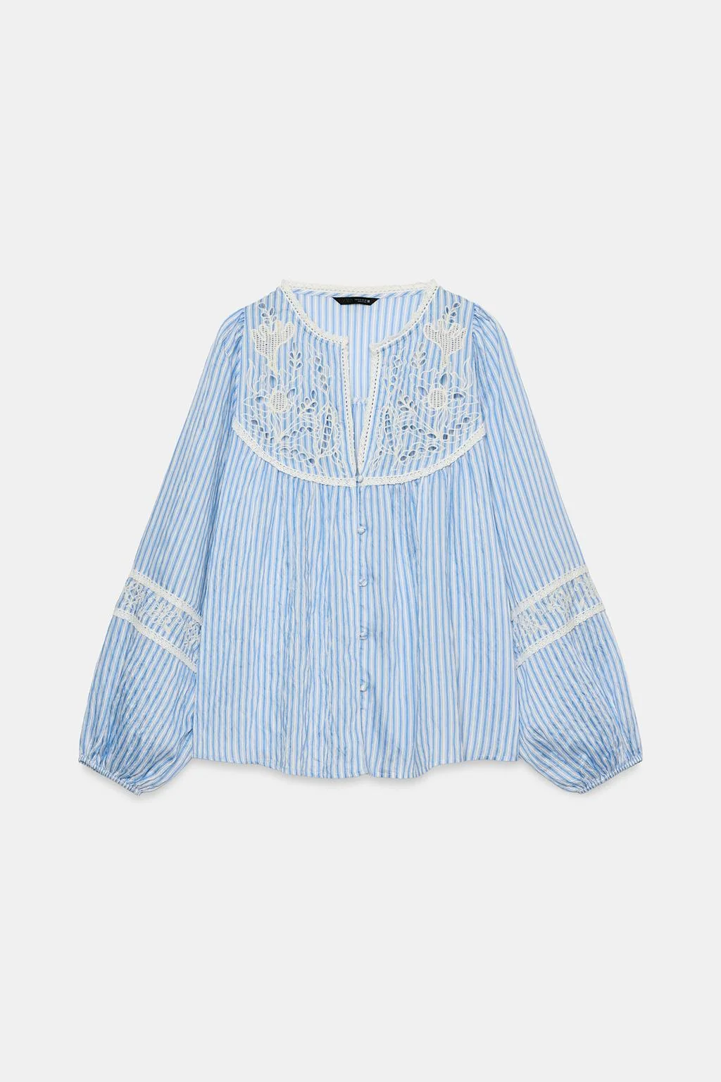 Вышитая полосатая блузка