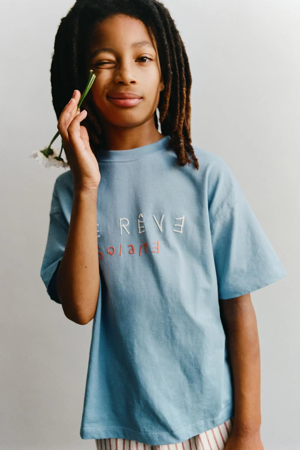 T-SHIRT WITH RAISED SLOGAN