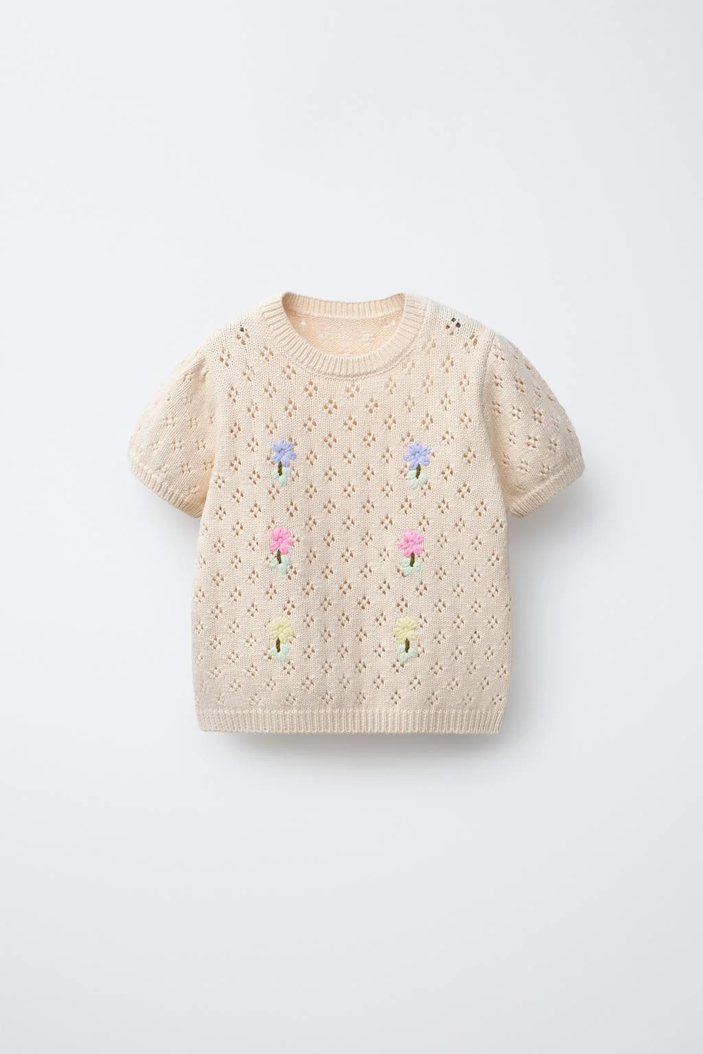 CUTWORK KNIT TOP WITH EMBROIDERED FLOWERS