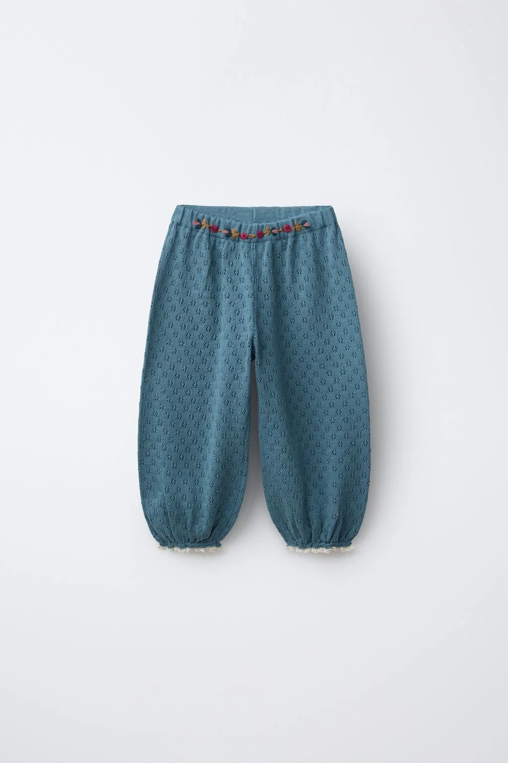 Трикотажные брюки-сарабу с вышитыми цветами — Трикотаж