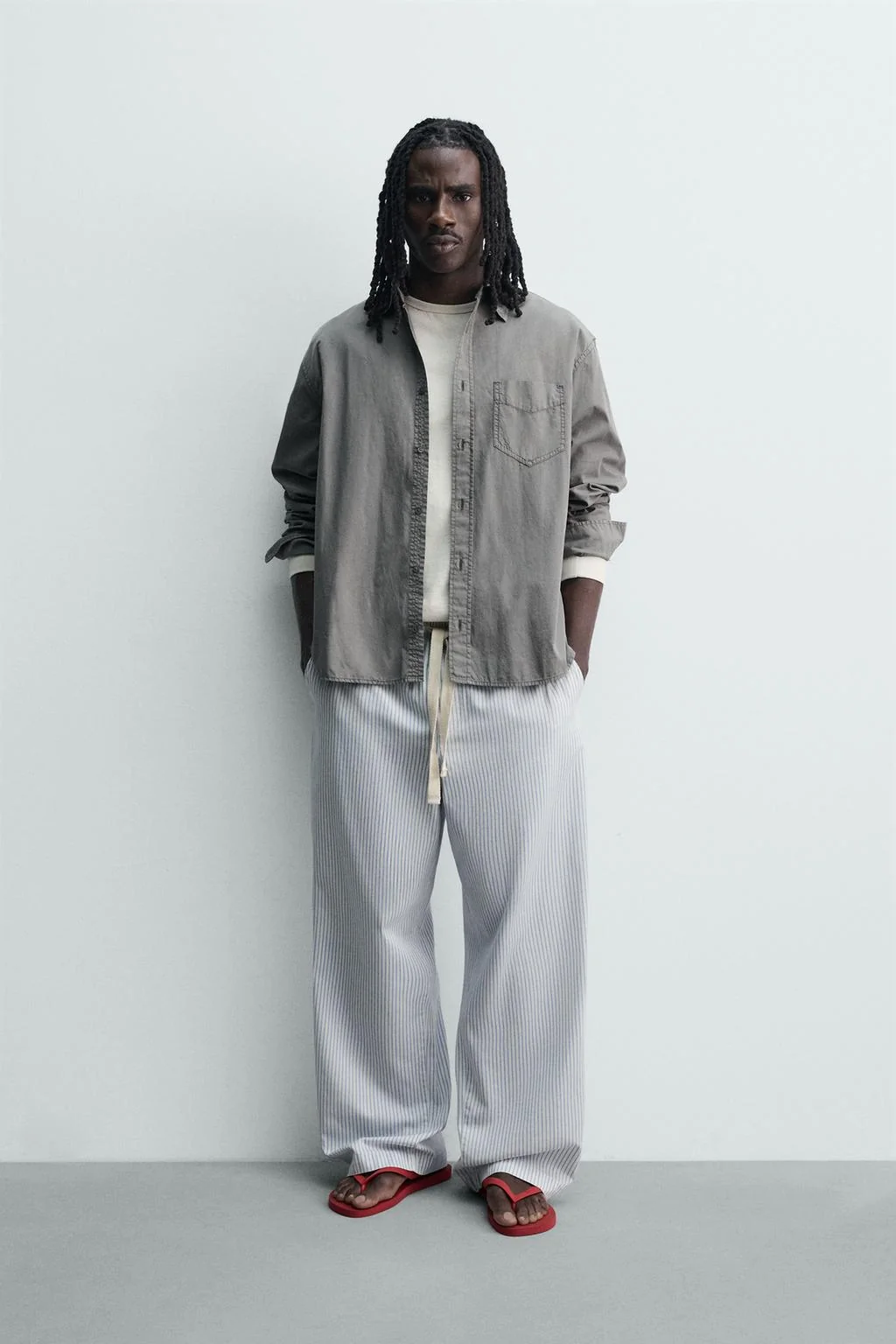 STRIPED BAGGY TROUSERS