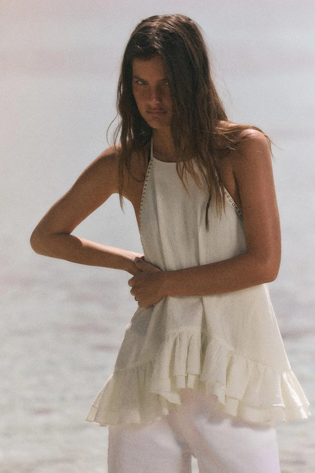 HALTER TOP WITH RUFFLES AND STUDS