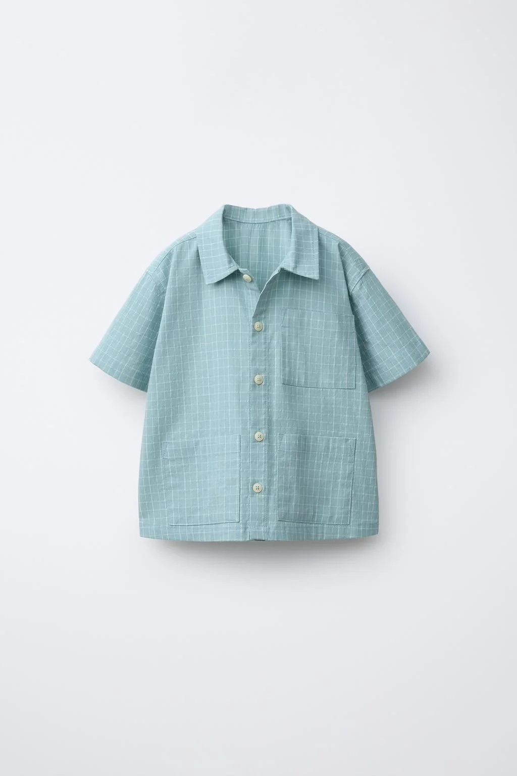 Рубашка в клетку с карманами