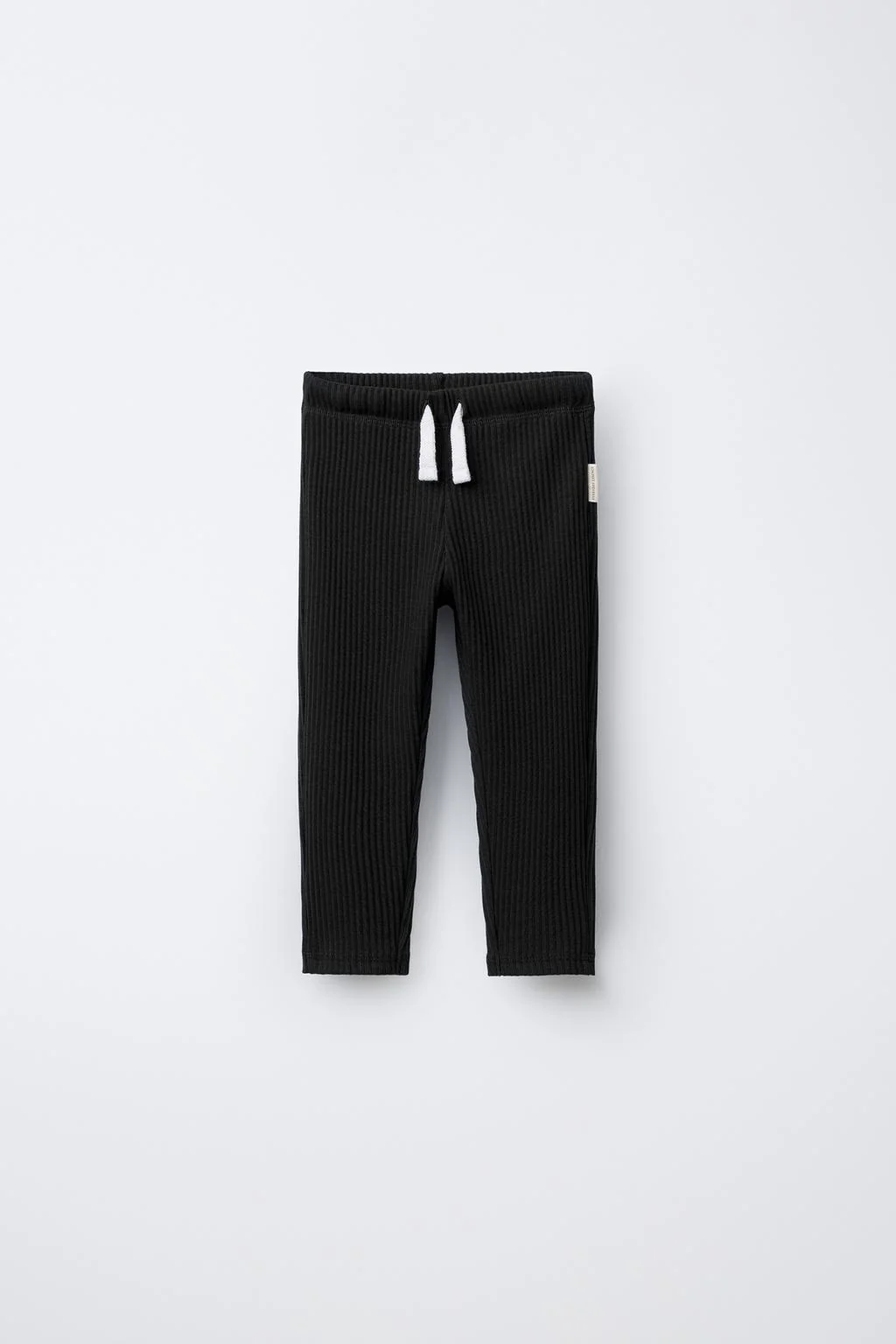 Леггинсы однотонные с ярлыком — Леггинсы