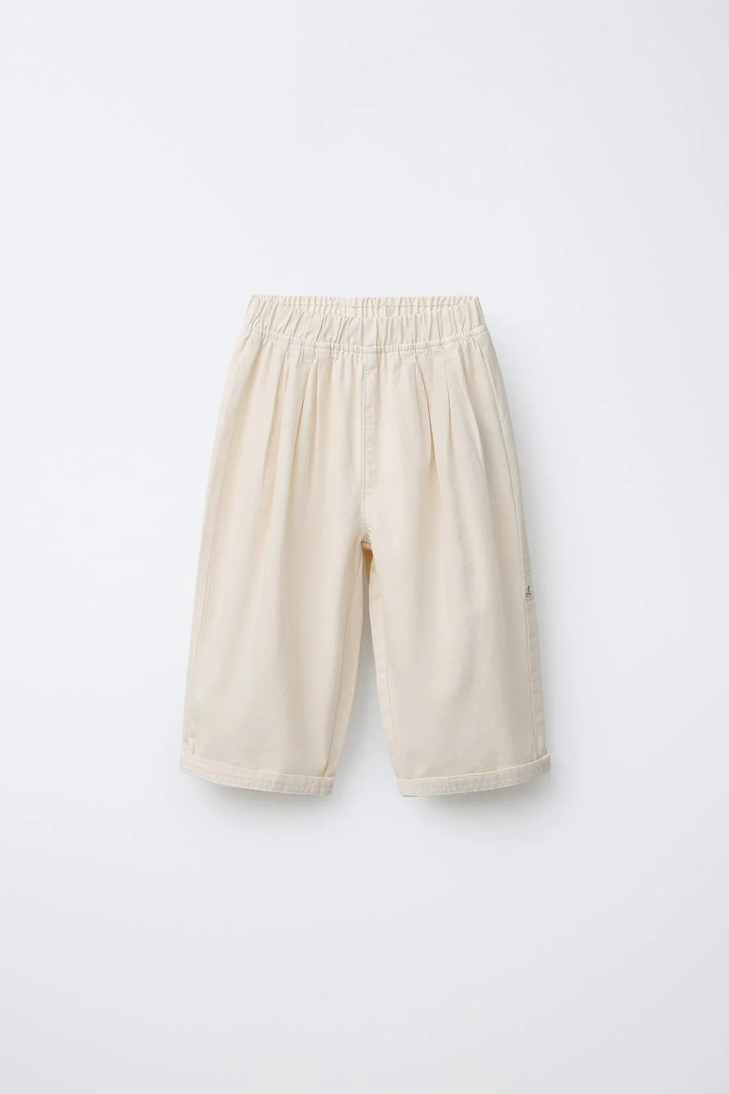 Брюки оверсайз из холщовой ткани с этикеткой