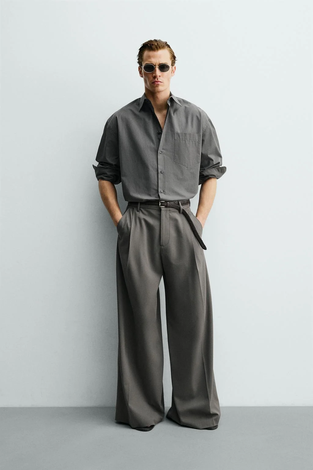 WIDE-LEG PLEATED TROUSERS