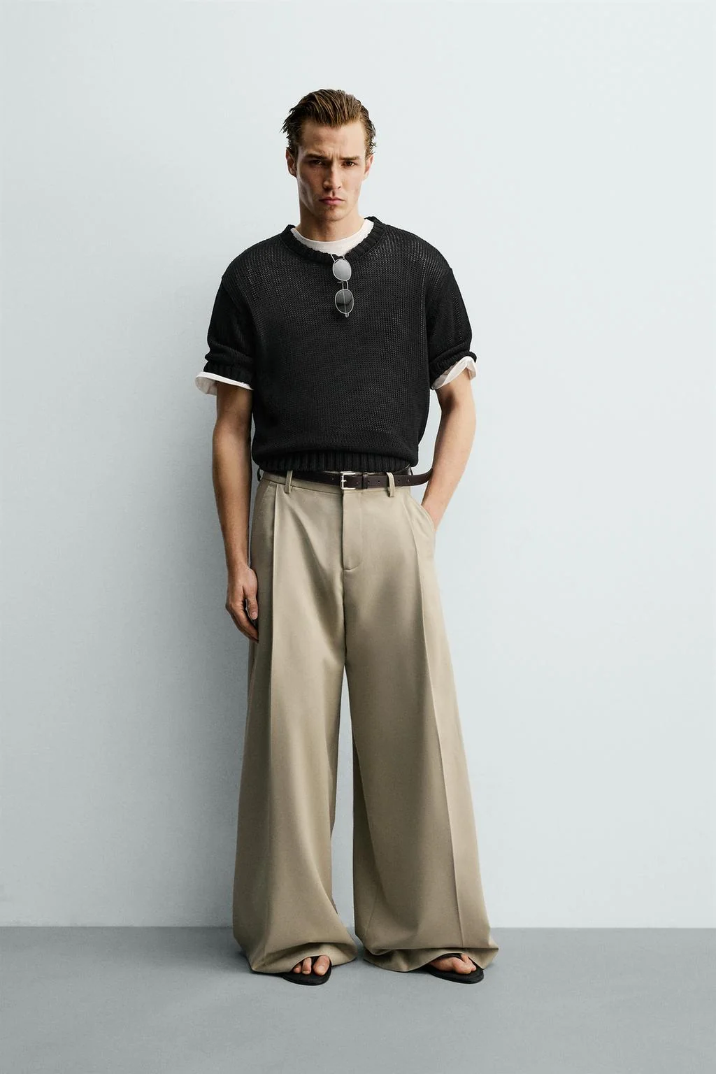 WIDE-LEG PLEATED TROUSERS