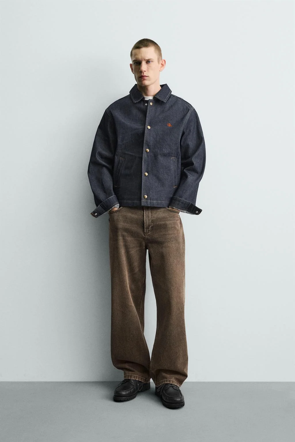 RELAXED FIT WAXED-EFFECT JEANS