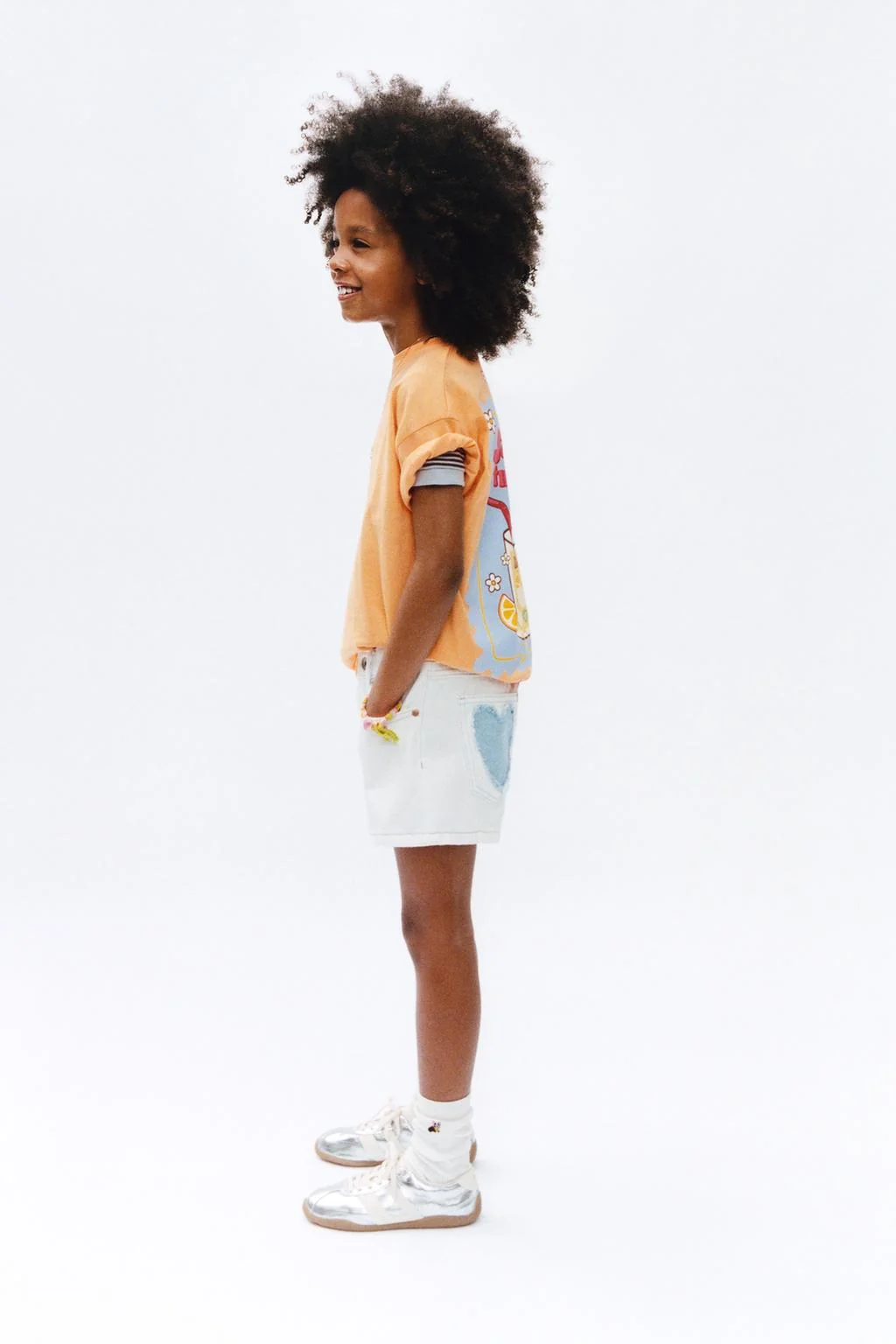 Джинсовые бермуды с нашивкой в виде сердца