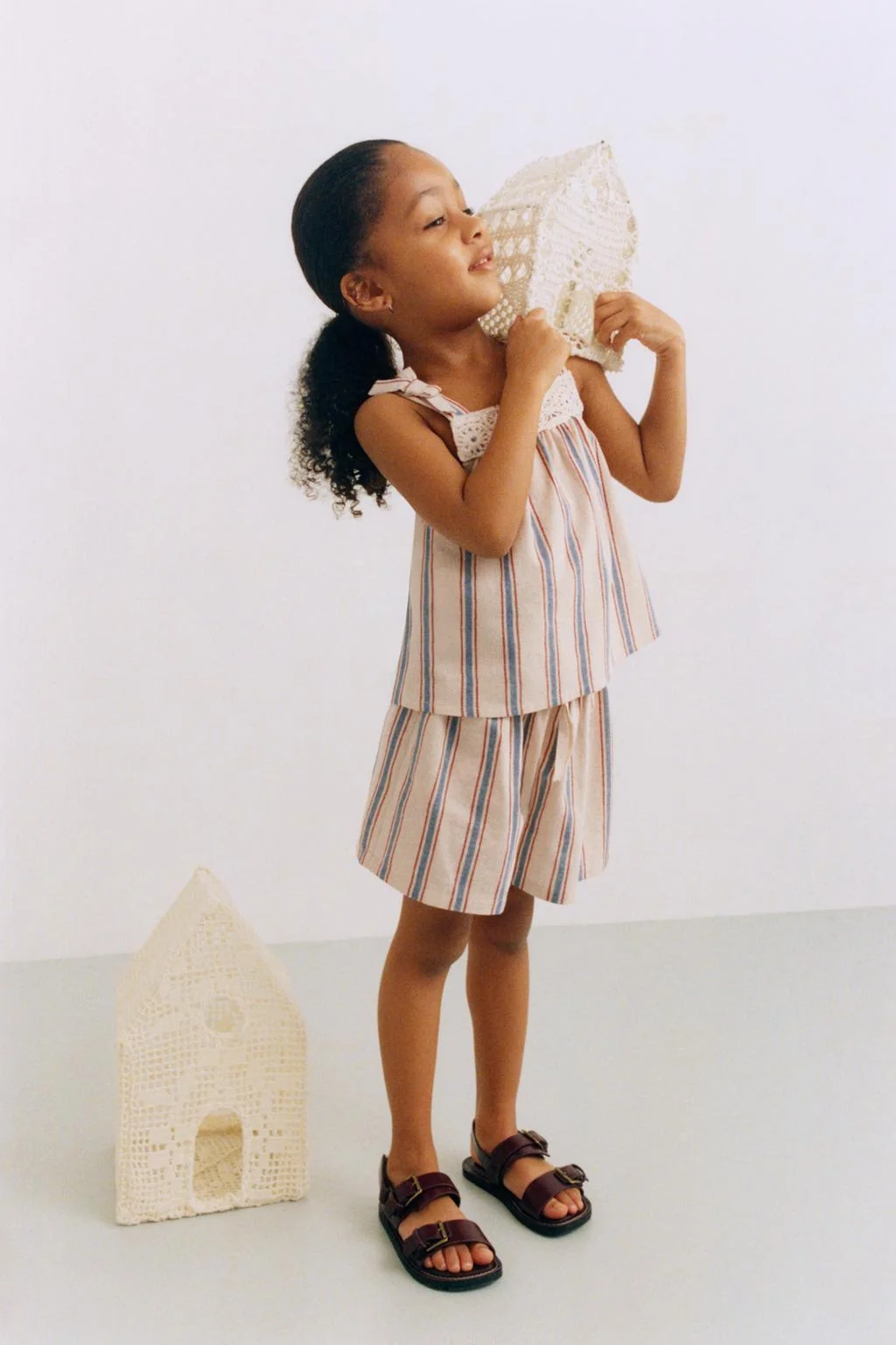 STRIPED TOP WITH CROCHET KNIT DETAIL