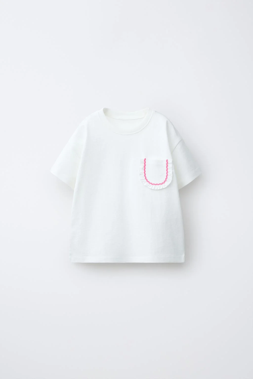 T-SHIRT WITH POCKET AND RUFFLE