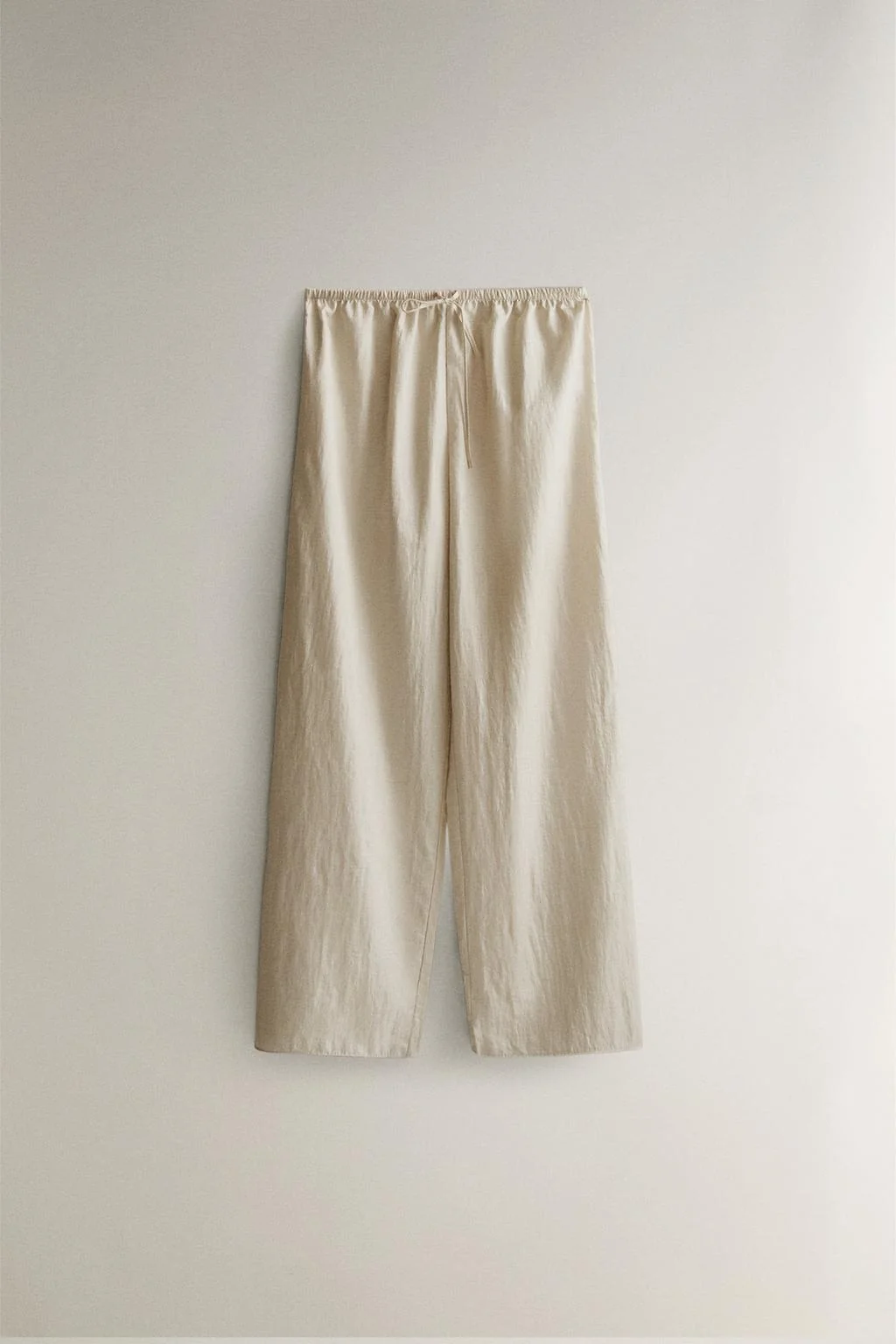 Брюки с атласным покрытием