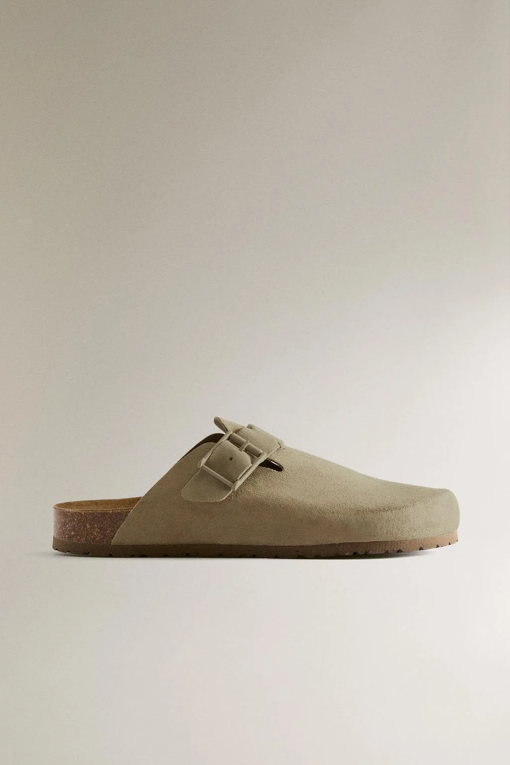 Кожаные сабо с пряжкой и отделкой контрастной строчкой