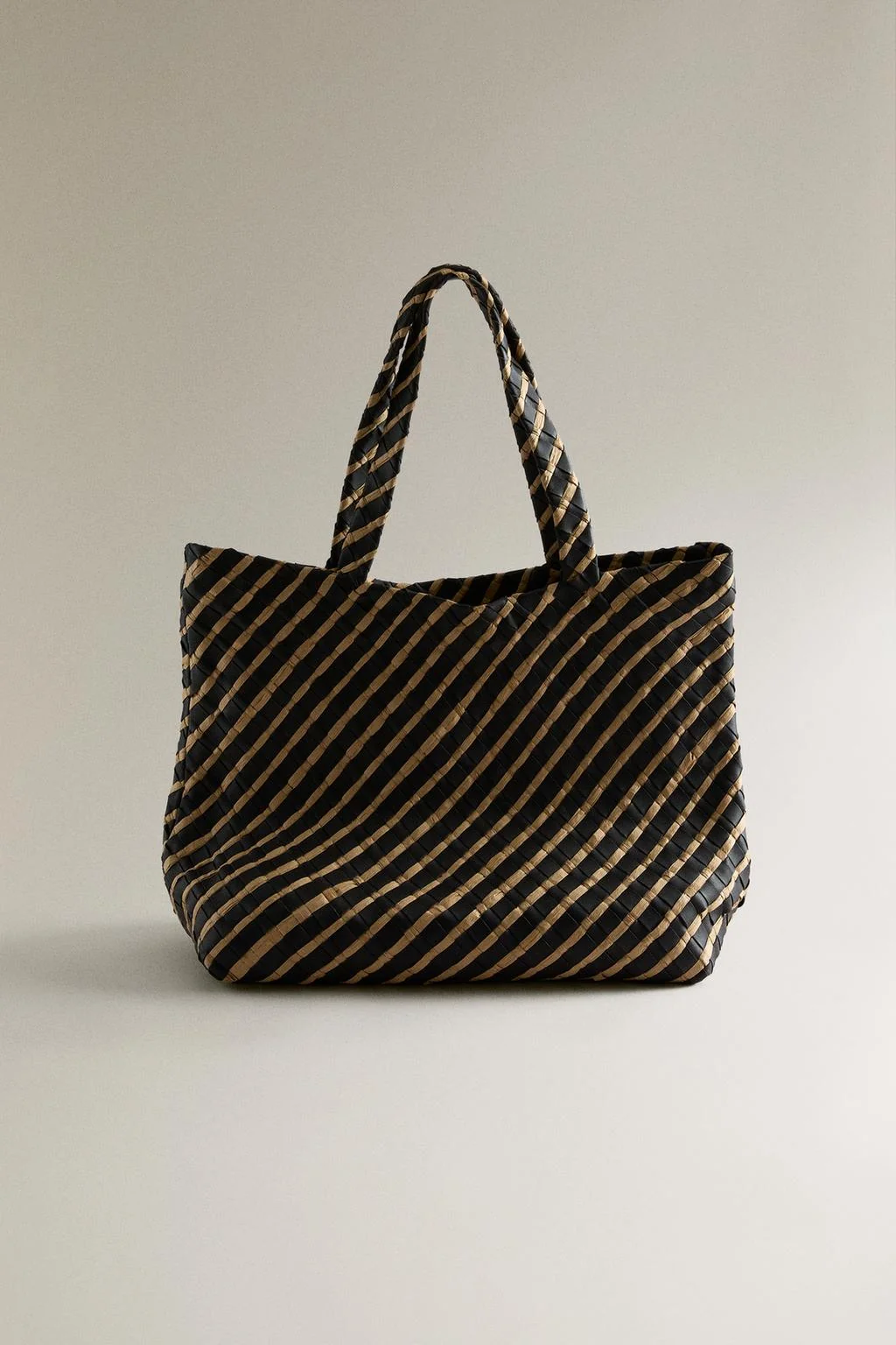 BRAIDED LEATHER TOTE BAG