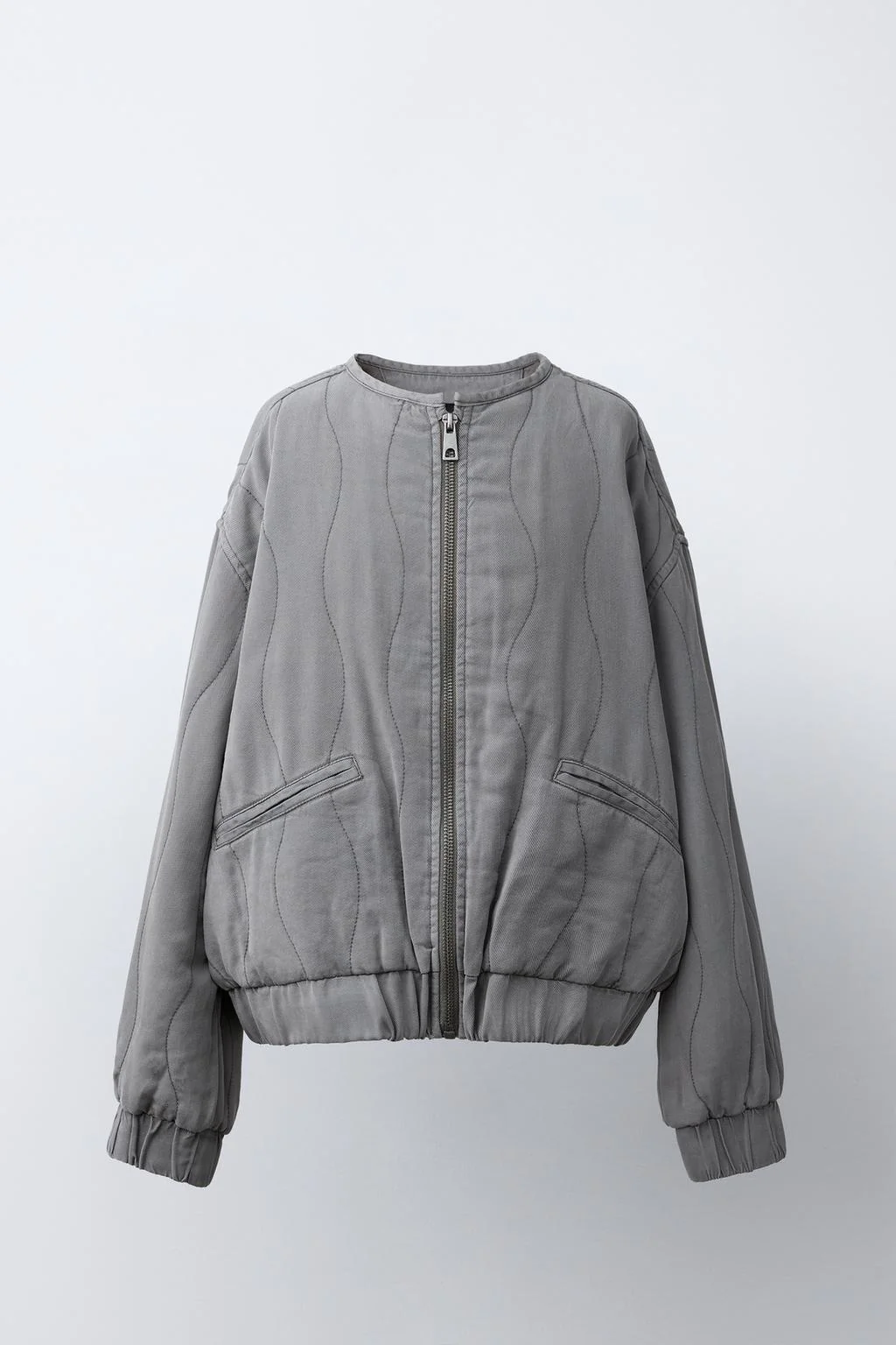 Пуховик свободного кроя