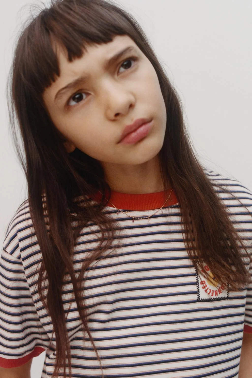 Полосатая футболка с этикеткой