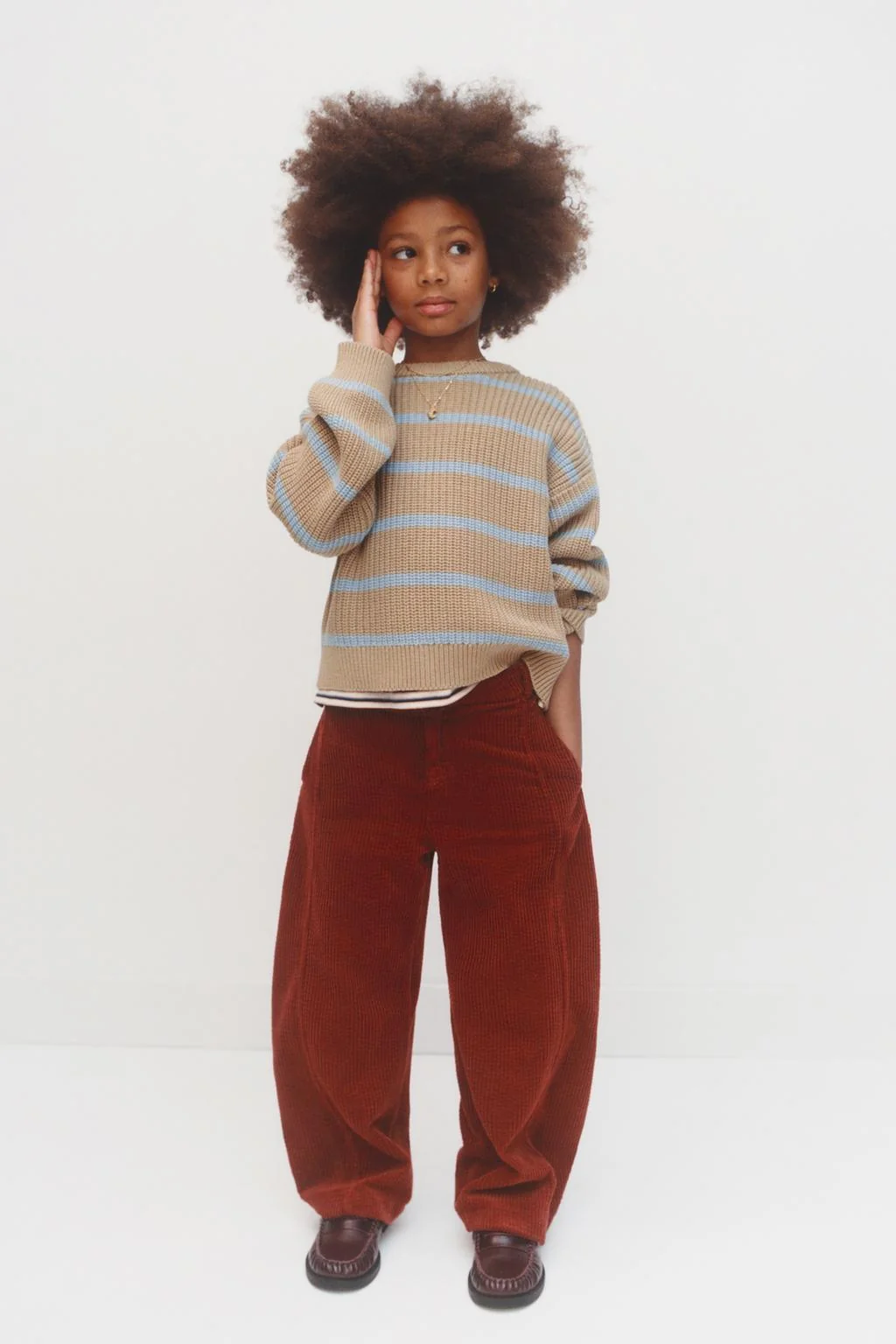 Полосатый трикотажный свитер