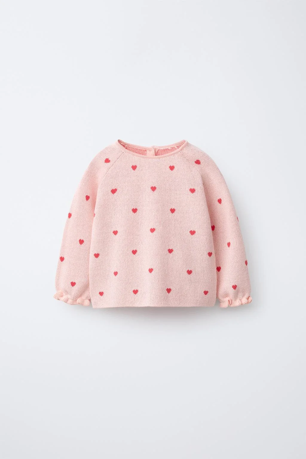 Трикотажный свитер с сердечками — Трикотаж