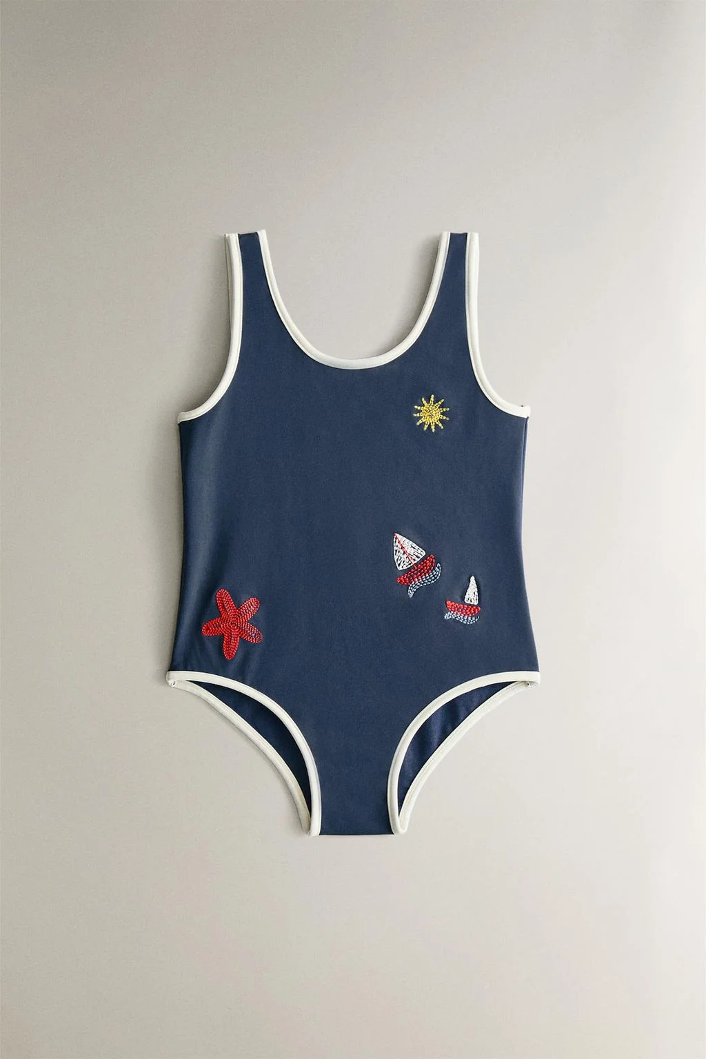 Детские пляжные шорты в морской тематике