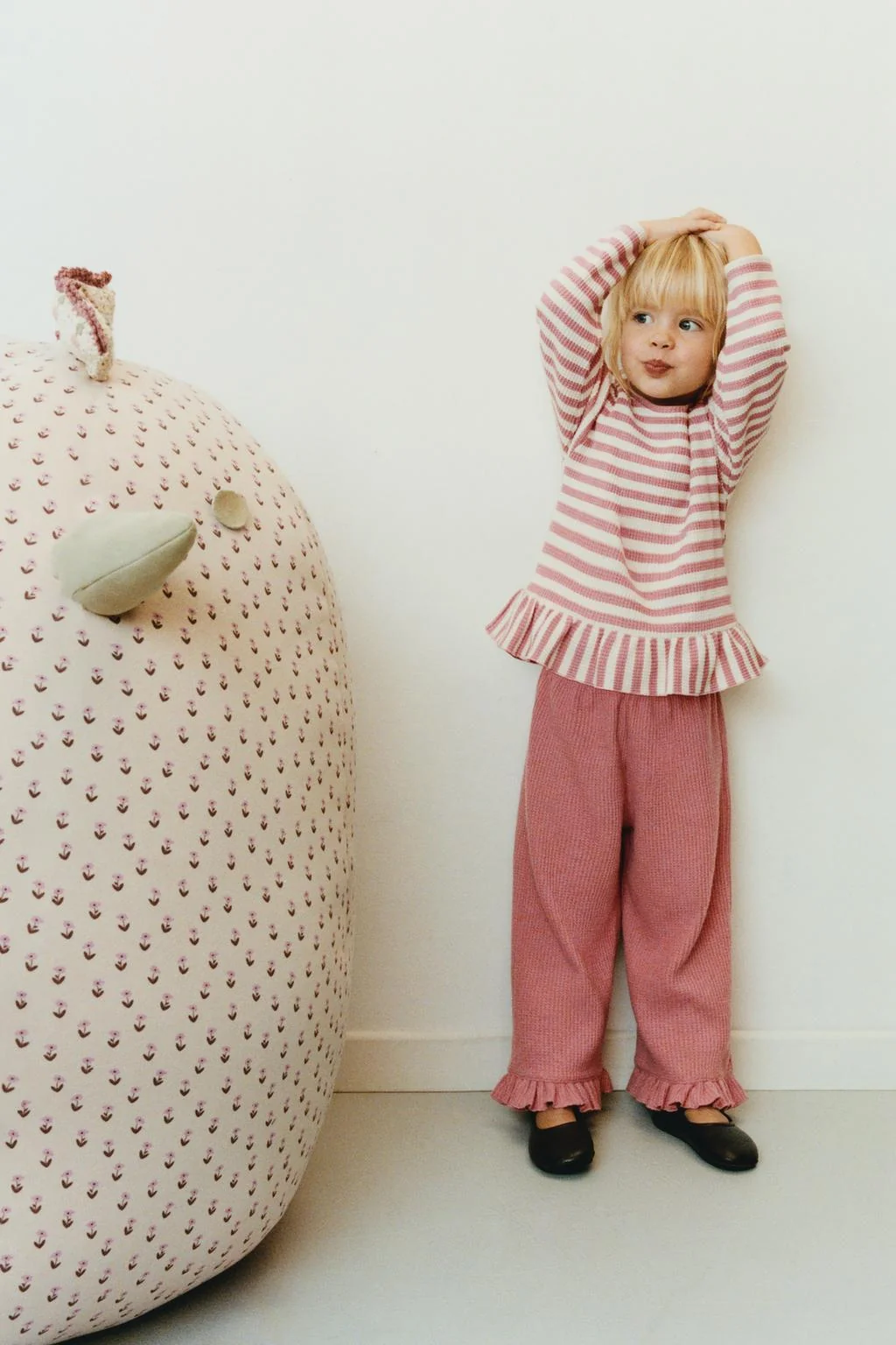 Полосатая вафельная футболка с пеплумом