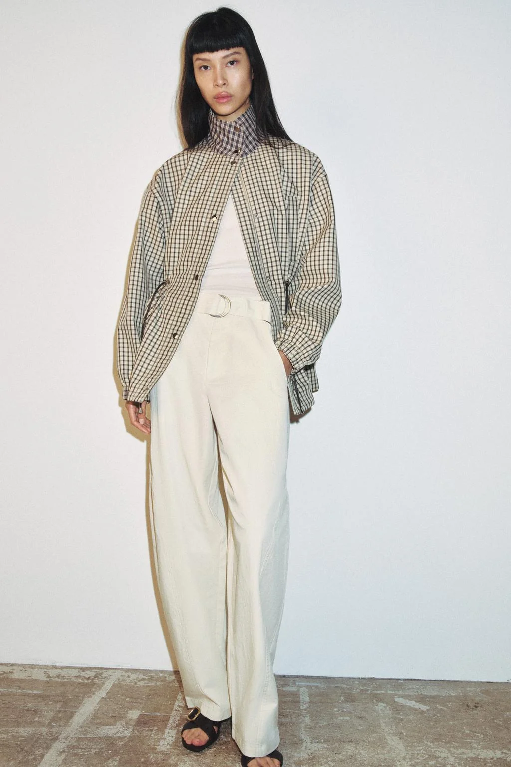 Клетчатая куртка с высоким воротником