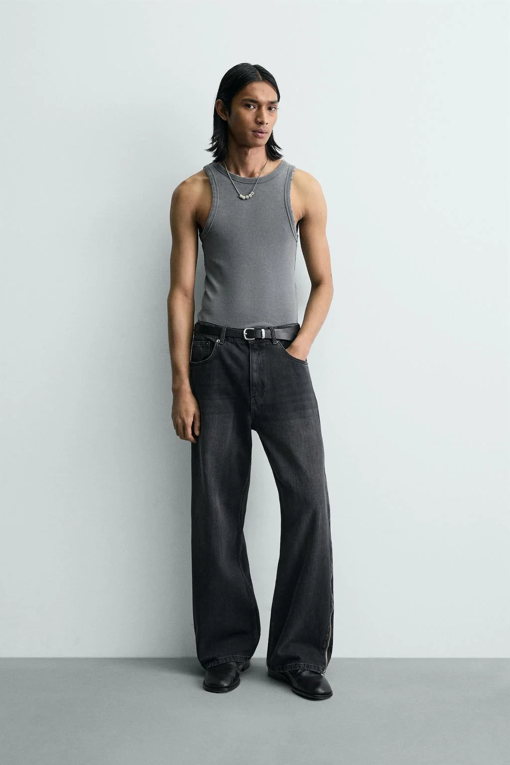 Джинсы с расклёшённой низом на молниях — Джинсы