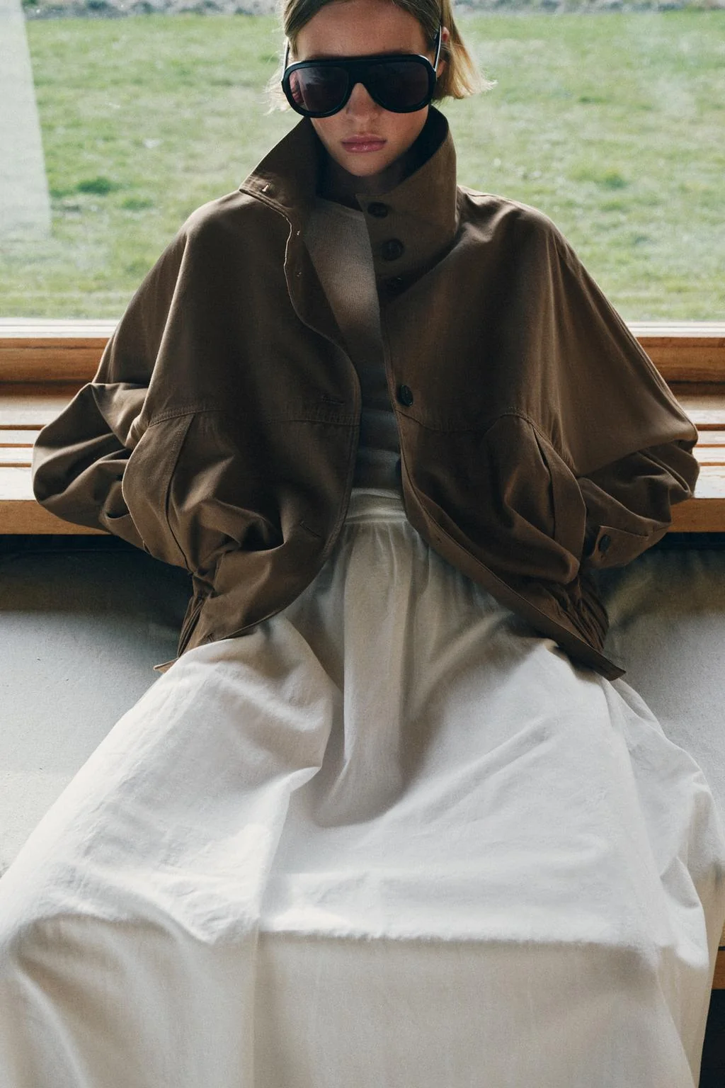 Куртка с высоким воротом и резинкой на подоле