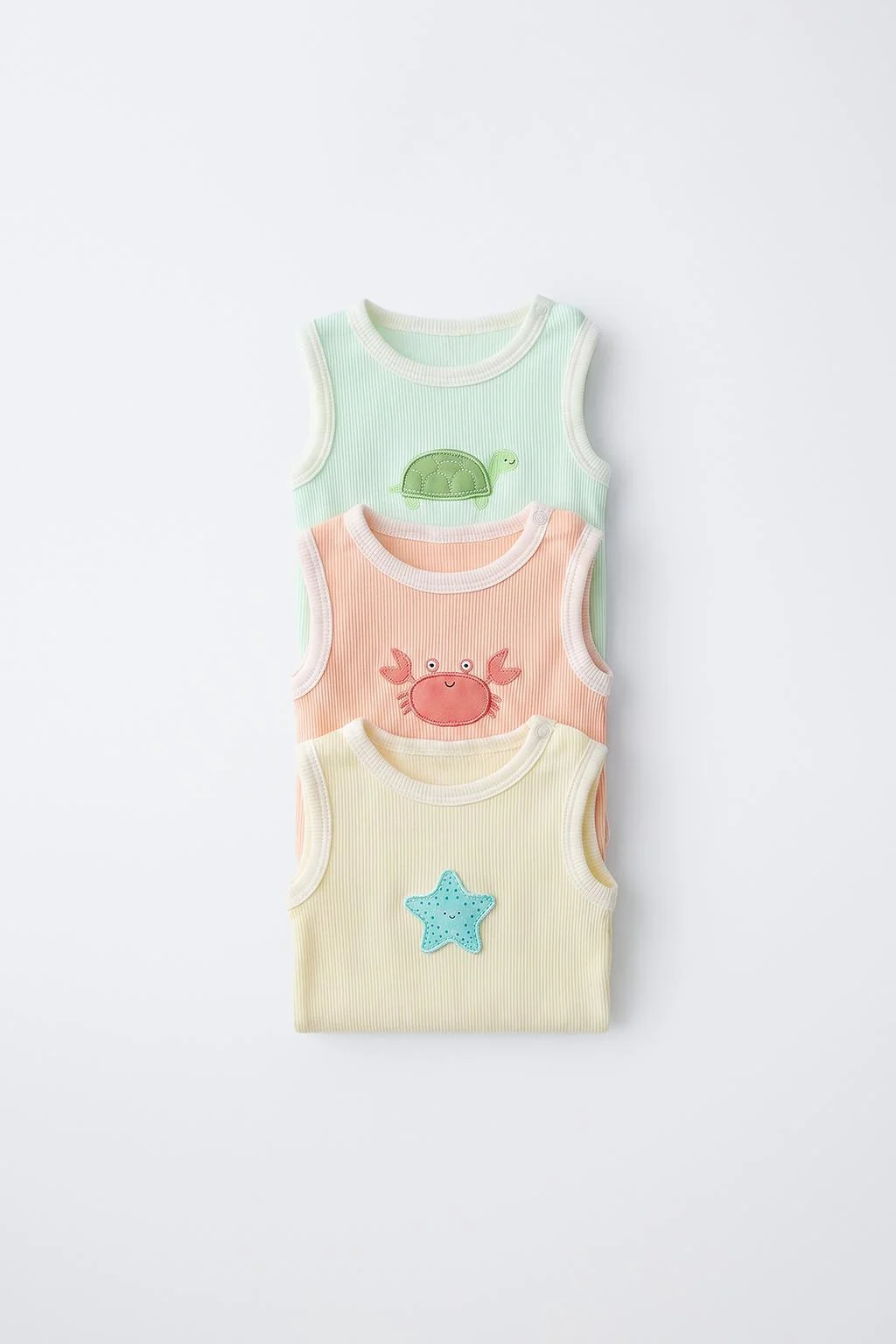 3-PACK OF SLEEVELESS BODYSUITS WITH PATCHES