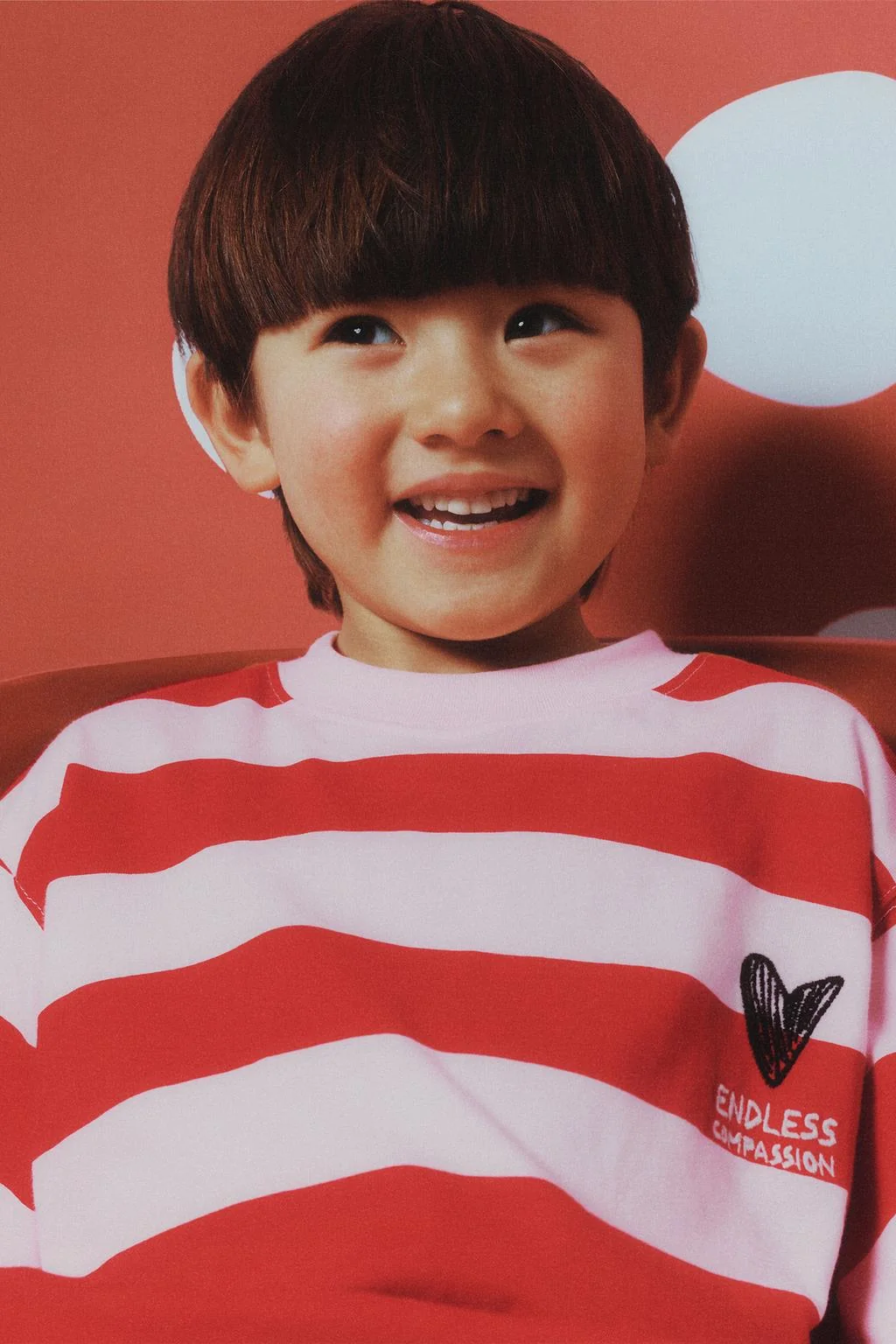 Футболка в полоску с сердечком