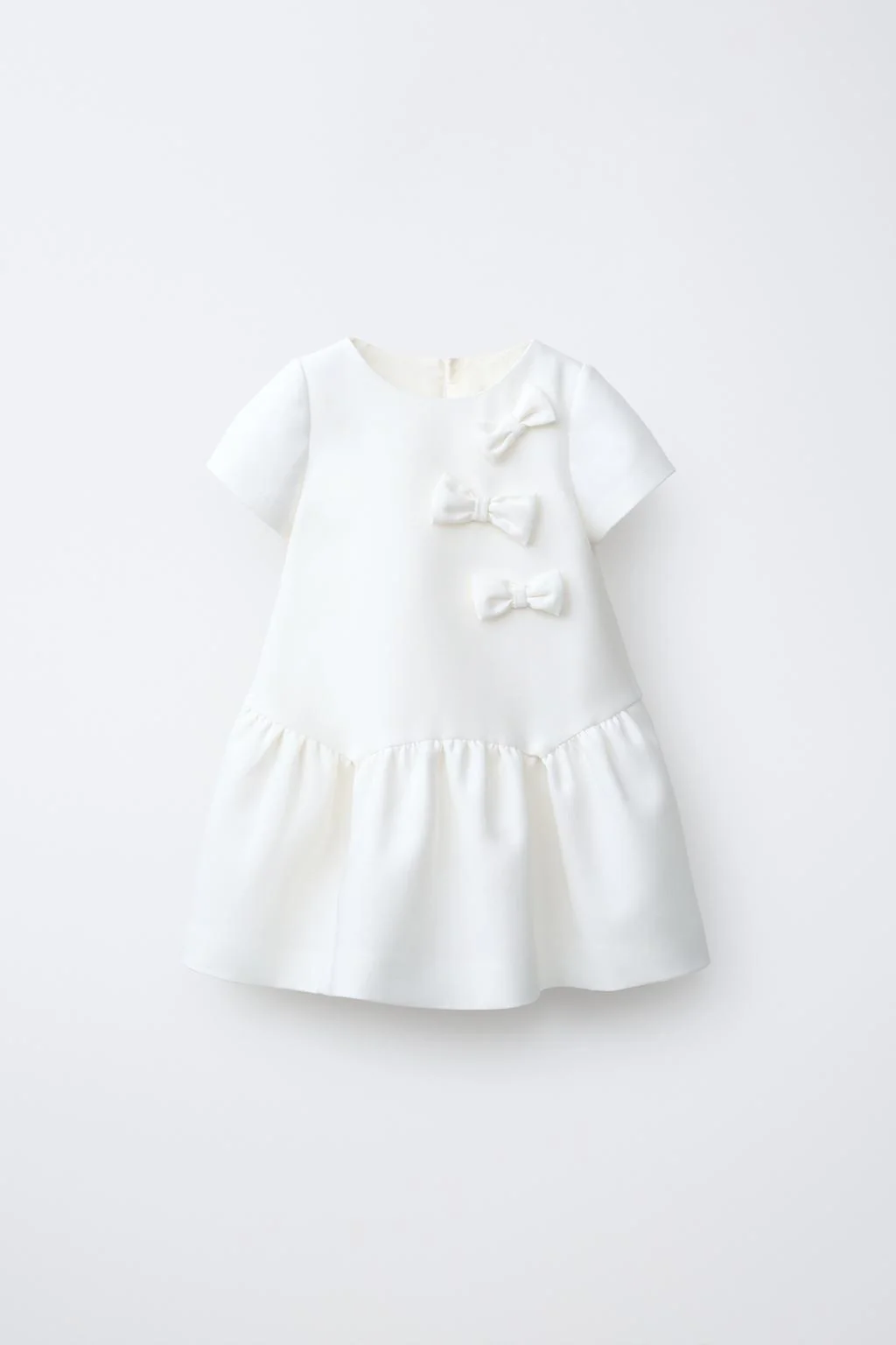 DRESS WITH BOW APPLIQUÉS