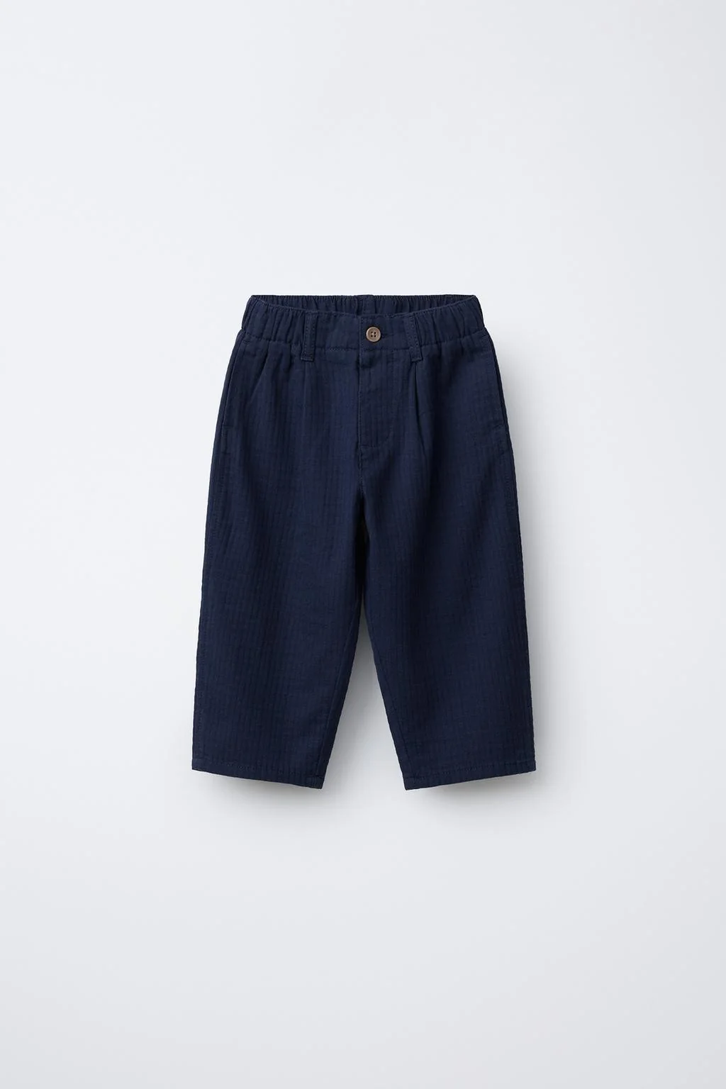 TEXTURED TROUSERS WITH LABEL