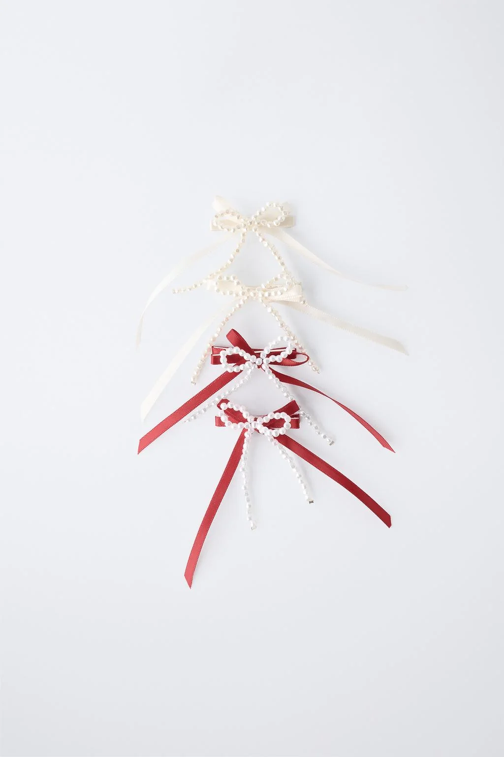 FOUR-PACK OF FAUX PEARL HAIR CLIPS