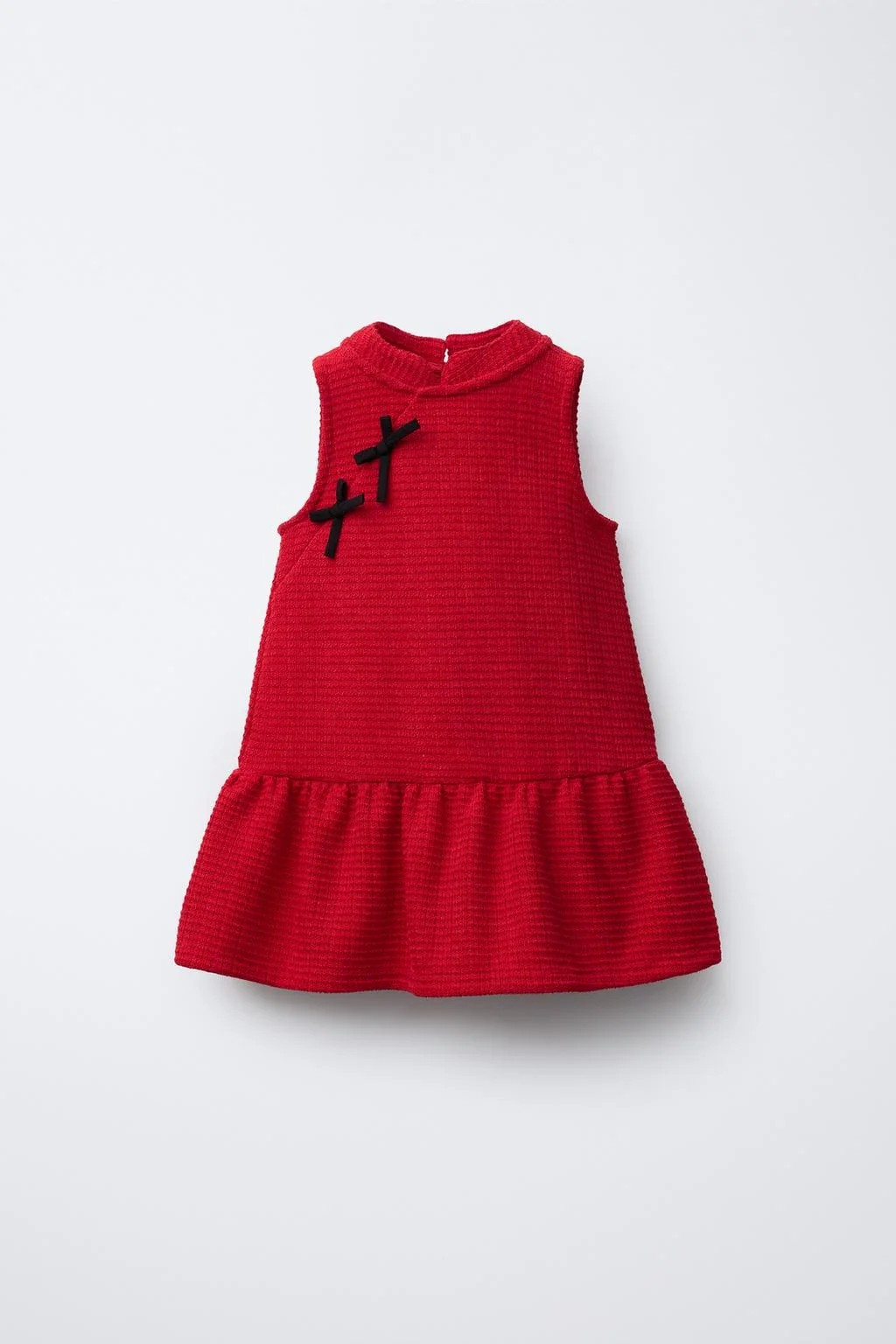 TEXTURED DRESS WITH CONTRAST BOWS